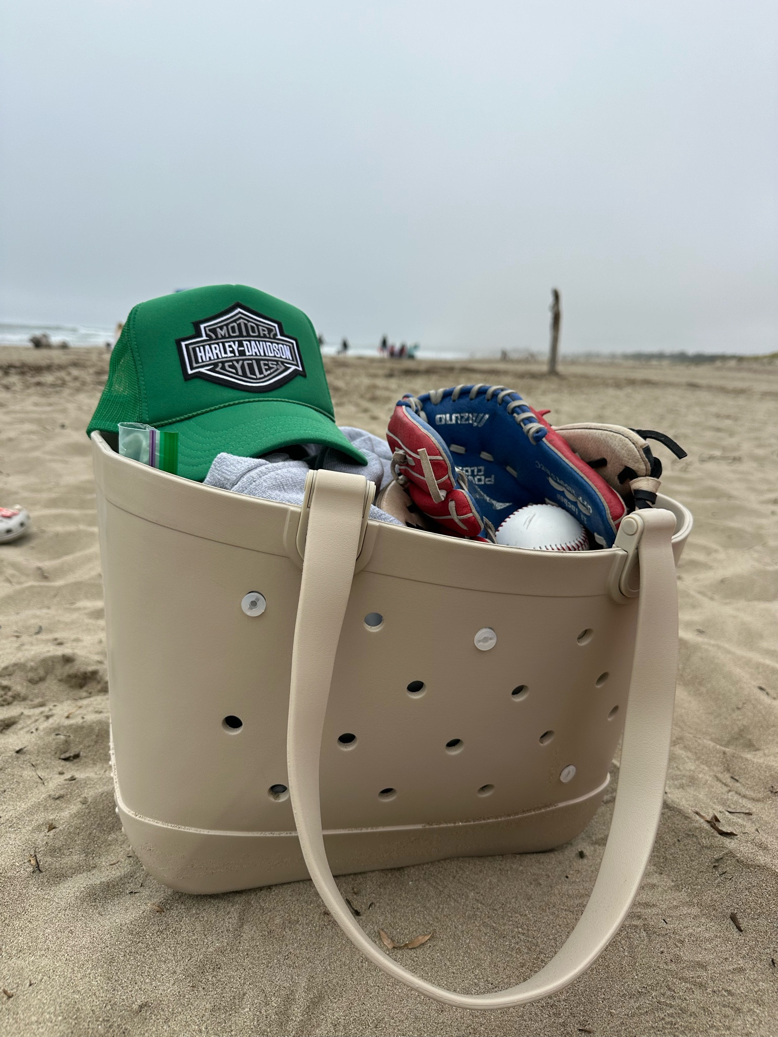 The best bag! Fits all our family things in it, doesn’t stain and sand comes right out!! 

#LTKTravel #LTKStyleTip #LTKSummerSales