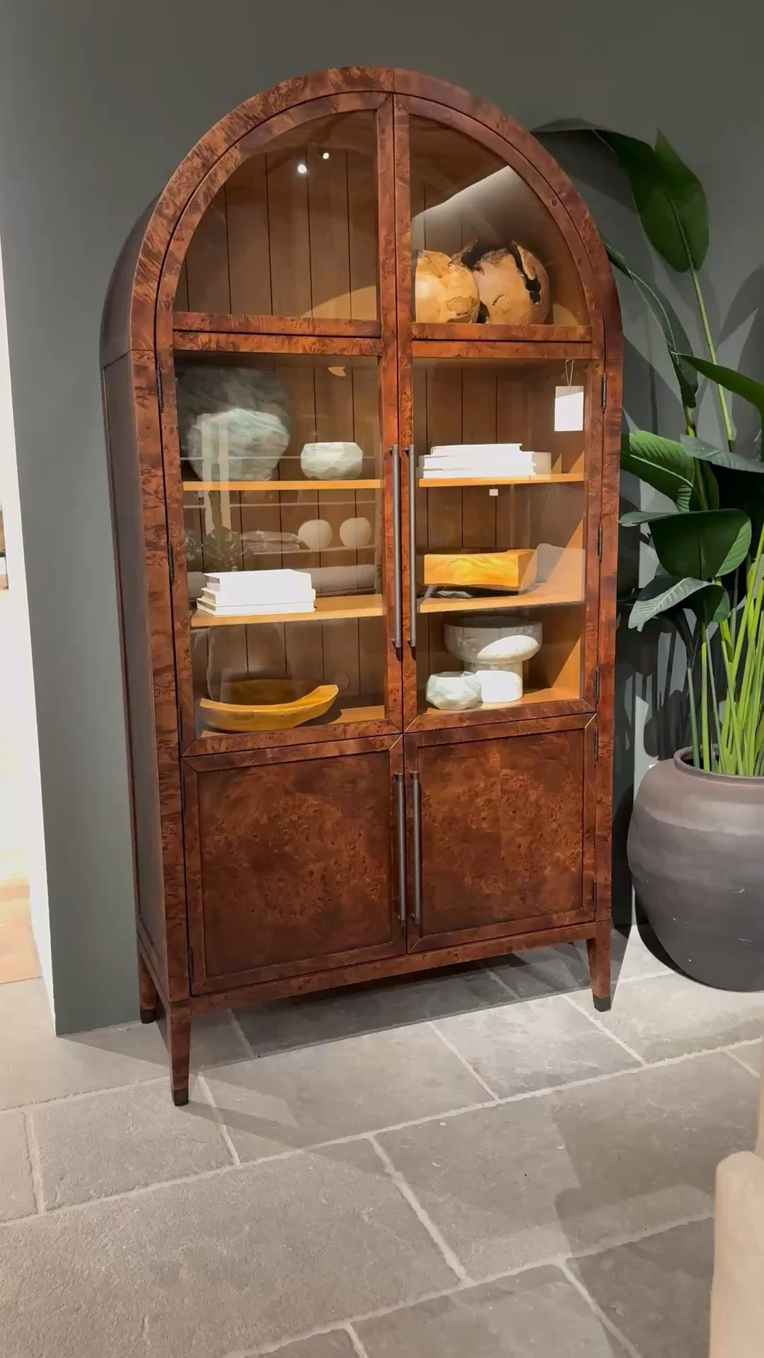 This elegant and gorgeous Burl wood glass cabinet console is now on sale.  Home decor, living room decor 

#LTKSeasonal #LTKHome #LTKSaleAlert