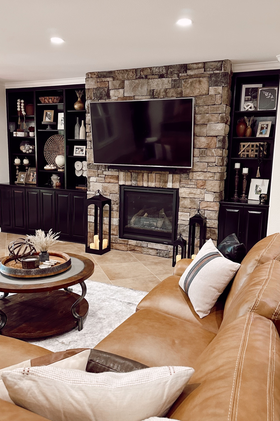 basement living room details!! Linked our throw pillow, similar couch, built in decor, lanterns & coffee table details!!

#LTKfindsunder50 #LTKhome #LTKstyletip