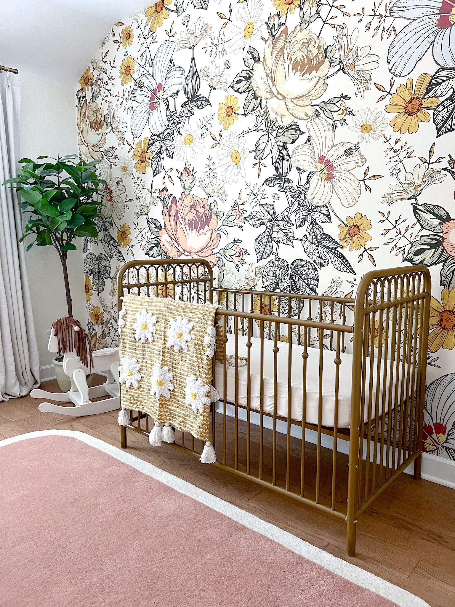 Brought new life to this nursery and prepped it for a #babygirl this time! 🌼 We can’s decide what our favorite part is: the wallpaper, the vintage rocking horse, or the daisy crochet….It’s all just precious. #WoodlandsStyleHouse
Construction: Evermon Homes


#LTKFamily #LTKHome #LTKKids