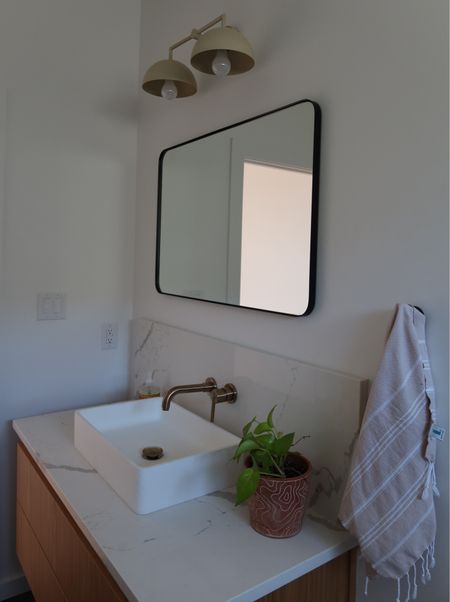 Delta plumbing, Amazon mirror + decor, Etsy lighting 

#LTKhome #LTKfindsunder100 #LTKfindsunder50