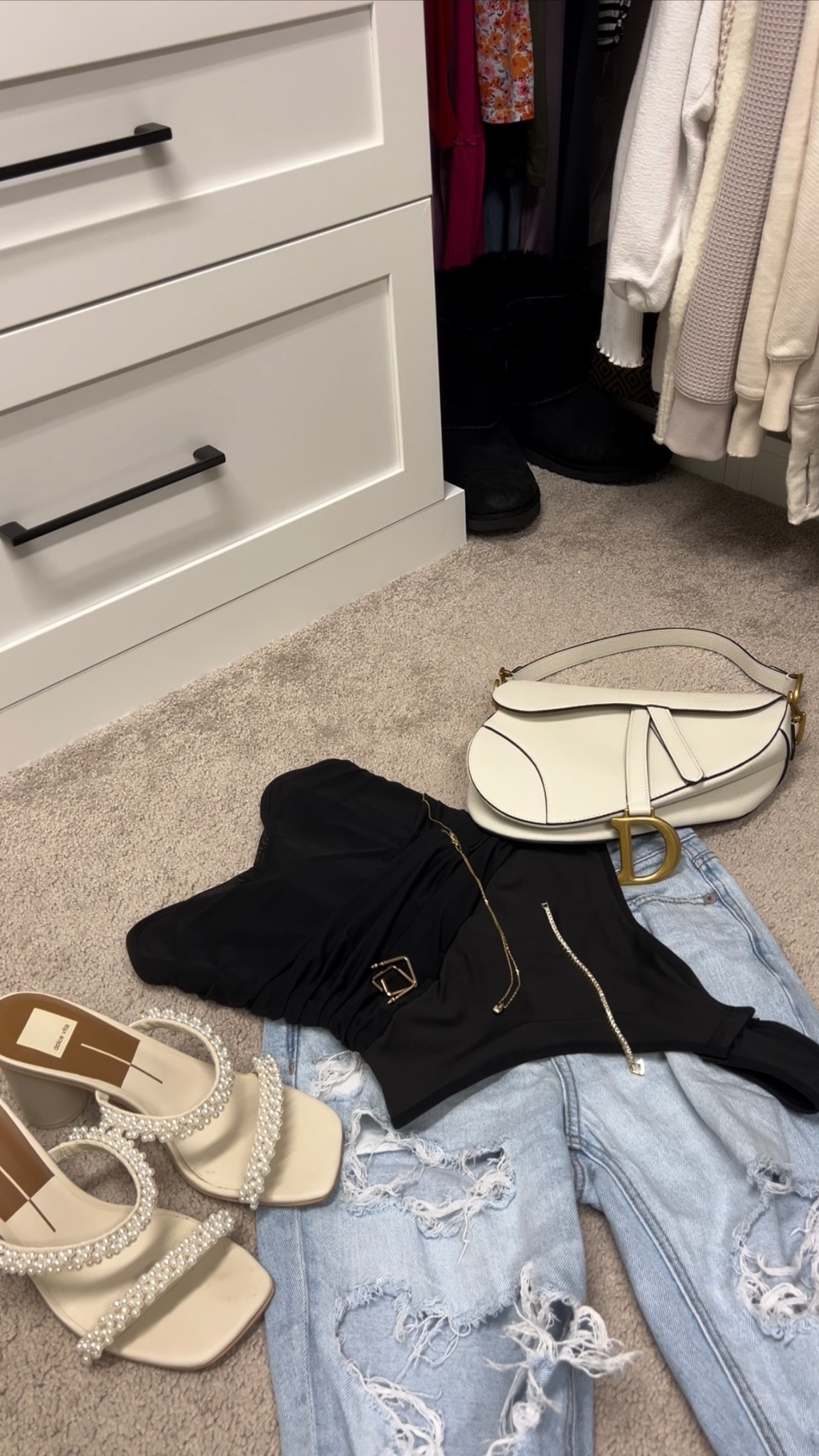 Serving effortless glam 🤍🖤
Ripped denim + a sleek black bodysuit, pearl heels, and a crisp white saddle bag ✨ this look is ready for dinner dates, rooftop drinks, or wherever the night takes you.

#OOTD #DateNightLook #CasualChic #PearlHeels #EffortlessStyle

#LTKU #LTKParties #LTKStyleTip