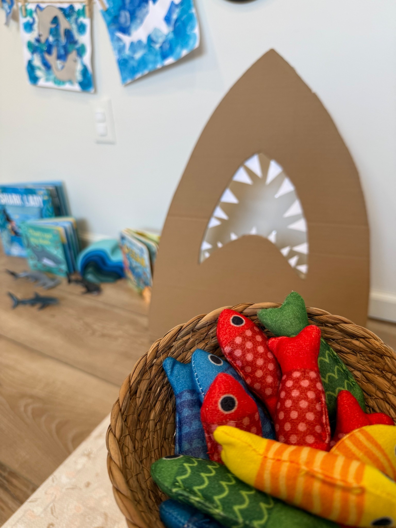 Toddler Activity: Feed the Shark 🦈 🐠✨

Apparently fish are food and not friends over here 😅 John made Macy the best cardboard  shark for her to play with for shark week! 

He used one of our endless cardboard boxes, cut out a shark shape, laminated a white sheet of paper, and added some sharp (but safe!) paper teeth. 🦷

I paired it with our @Hahaland fish toys, and Macy was so into it—kept her busy for a good chunk of time this the morning! You could totally make your own fish out of paper or cardboard, or even use ball pit balls for a quick and easy option.

Make it a game by asking your little one to feed the shark by color or count for an added learning twist! 🎣

We finished off with a few of our favorite shark-themed books—such a fun and easy way to celebrate Shark Week with toddlers! 💙🌊

#sharkweek #cardboardcrafts #toddleractivities #creativekids #diyforkids  #toddlertoys #creatorsearchinsights #CapCut 

#LTKFamily #LTKSeasonal #LTKKids