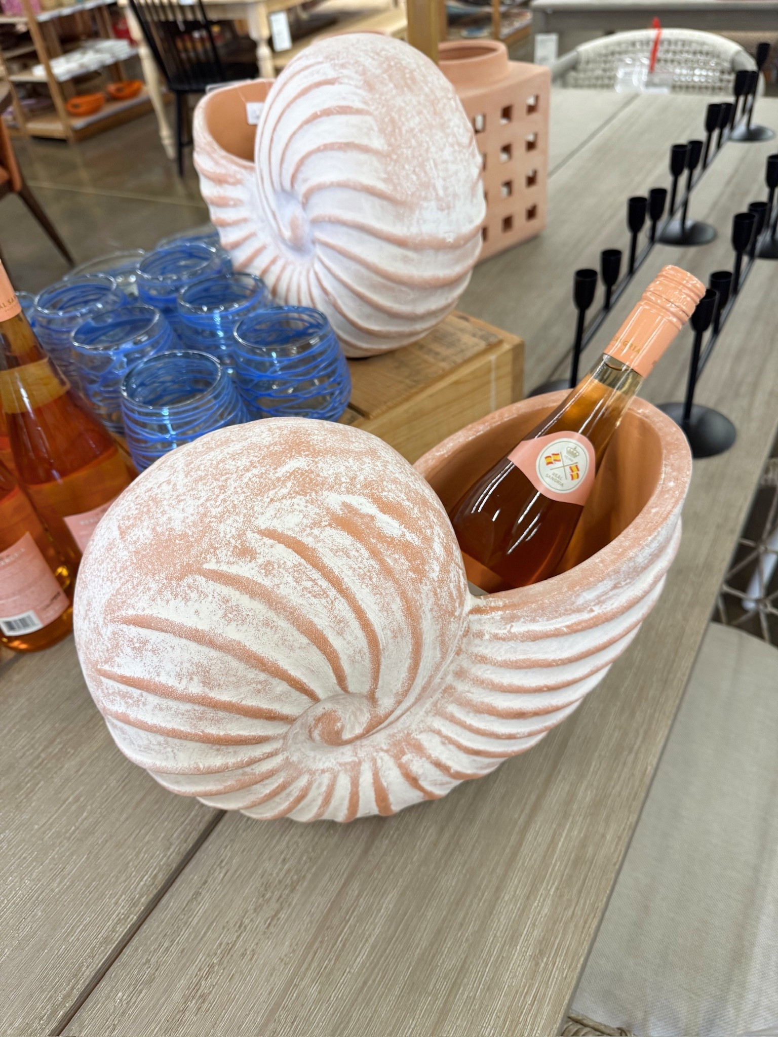 World Market has the cutest spring arrivals right now! I love how they styled this seashell planter as a wine bottle holder. 🐚 

#LTKSpringSale #LTKSeasonal #LTKHome