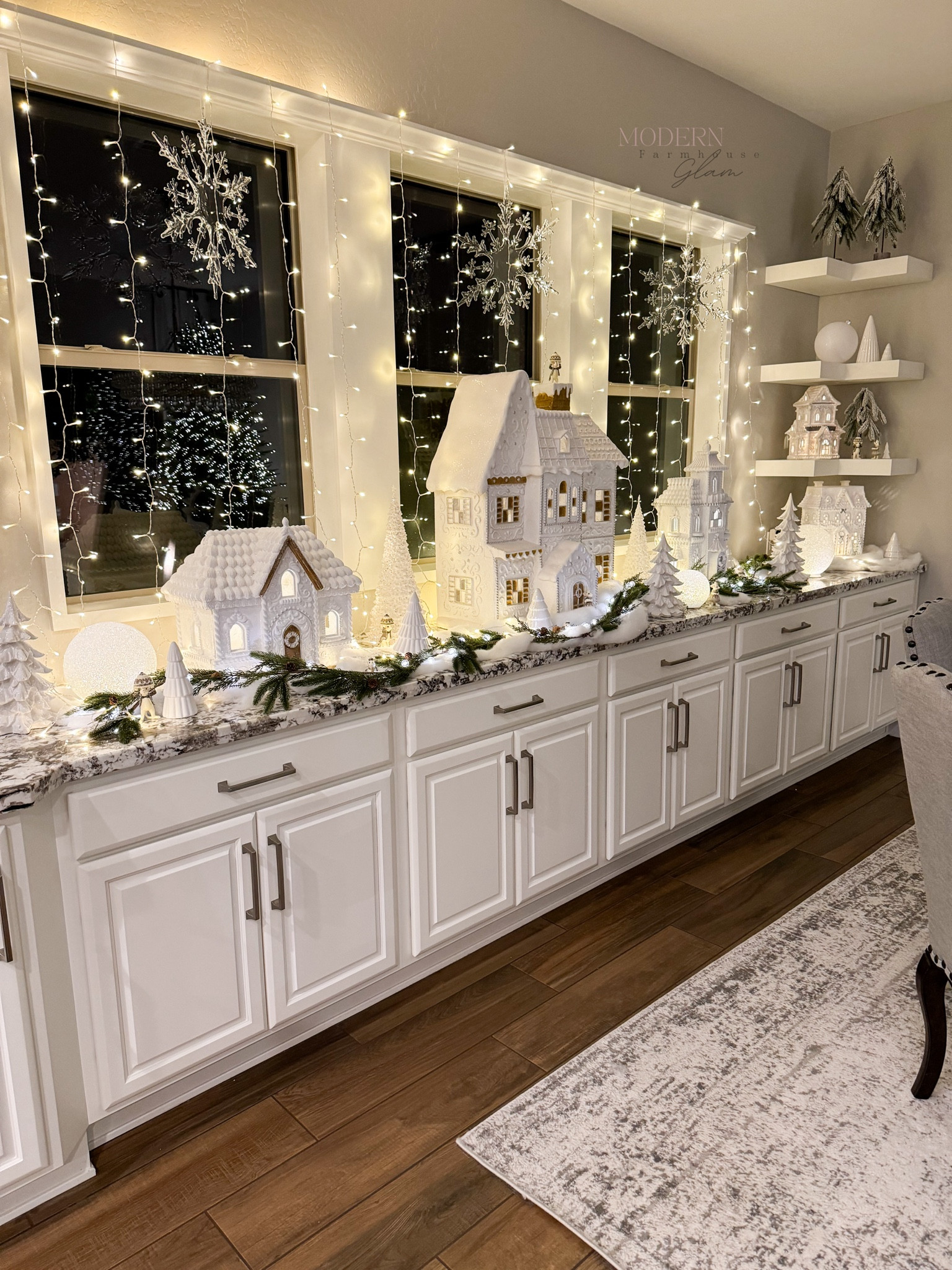 Gingerbread houses & Twinkling Curtain Lights
These larger-than-life gingerbread houses are the perfect statement pieces to bring the holiday spirit alive!  Paired with these sweet gingerbread mice, glowing snow globes, green garland and snow decor, they create a magical winter wonderland! The twinkling curtain lights really elevated the display.  Try these behind a Christmas display on your window! 

#LTKSeasonal #LTKHoliday #LTKHome