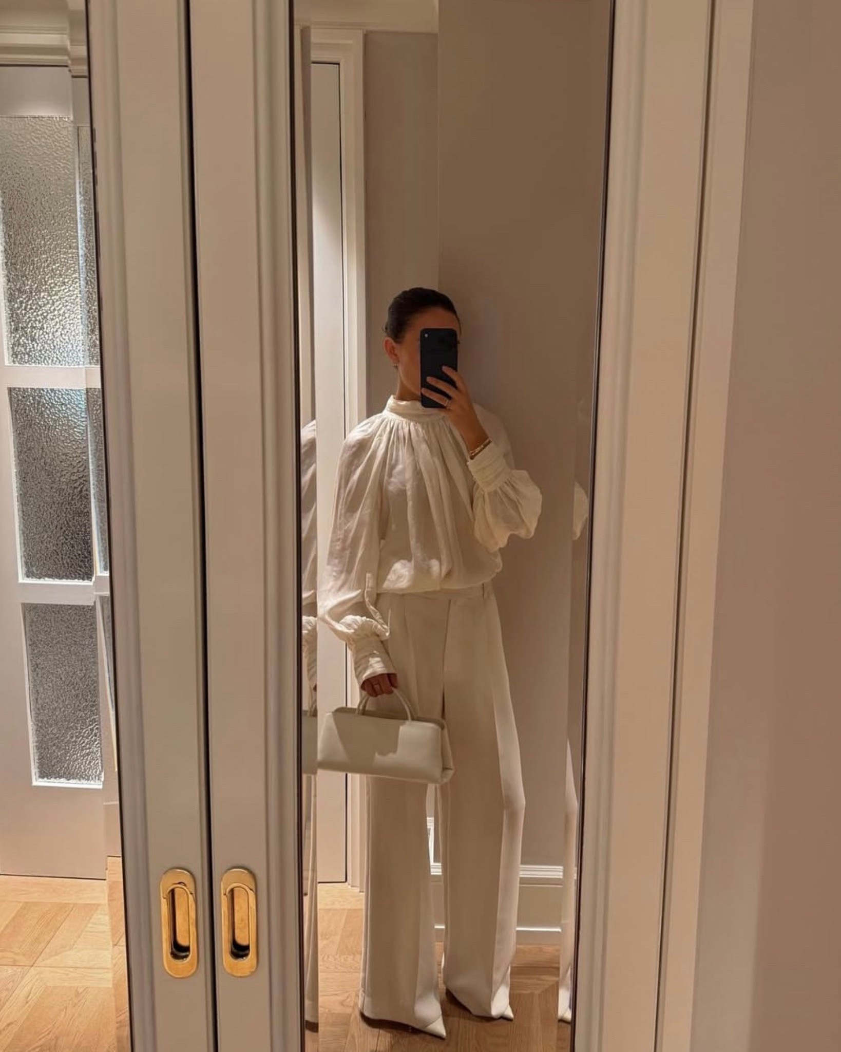 White on white🤍 wearing a beautiful white blouse by H&M styled with white Andiata pants and my favorite white bag by Verafied

#LTKstyletip #LTKFashionMonth