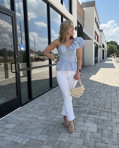 Fun statement top. Zips up the side. Snug fit. Runs tts. Smocking at the back. White denim. Kick out style. High rise. LOVE! I size up one size in the white. Linking accessories. 
Great look for date night, or out with friends. 

#LTKStyleTip #LTKFindsUnder100 #LTKItBag