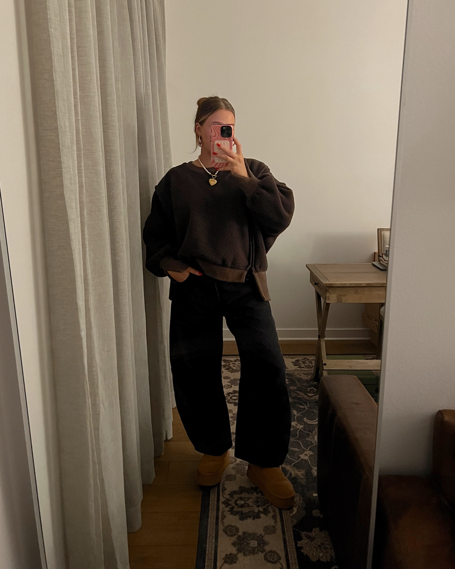 Jeans tts they have a looser wide leg fit im 5’ 5” and they are mid rise baggy and a bow leg i love these! Size down in free people sweatshirt it runs super oversized it’s fuzzy and soft and I’m in a small. Size down 1/2 in boots! 