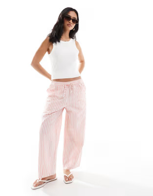 ASOS DESIGN Petite seersucker pull on barrel leg pants in pink stripe | ASOS (Global)