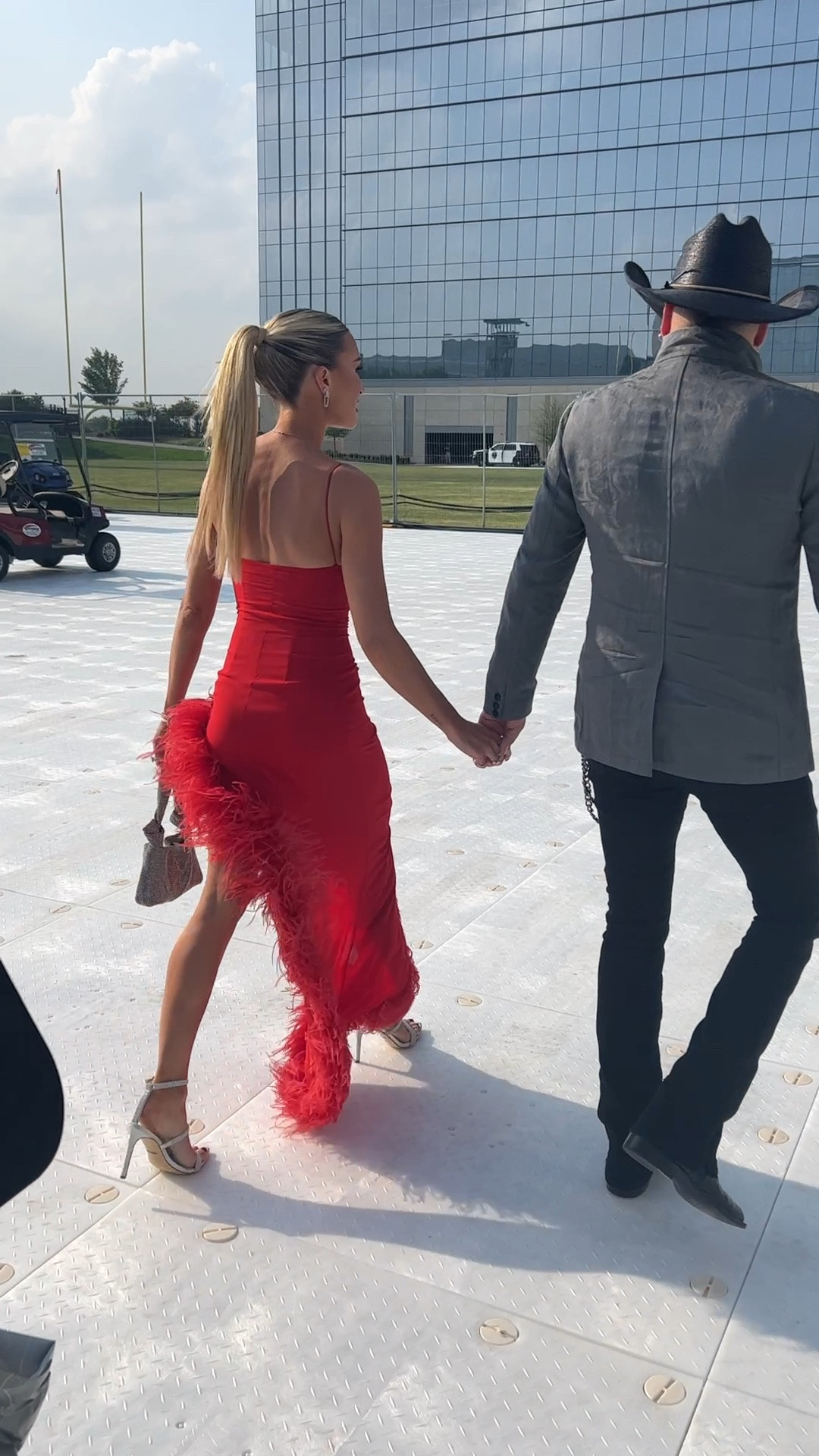 ACM Awards entrance ❤️ Linking my dress and then a similar one! 

dress l red dress l award show l fancy dress l black tie dresses l feather dress