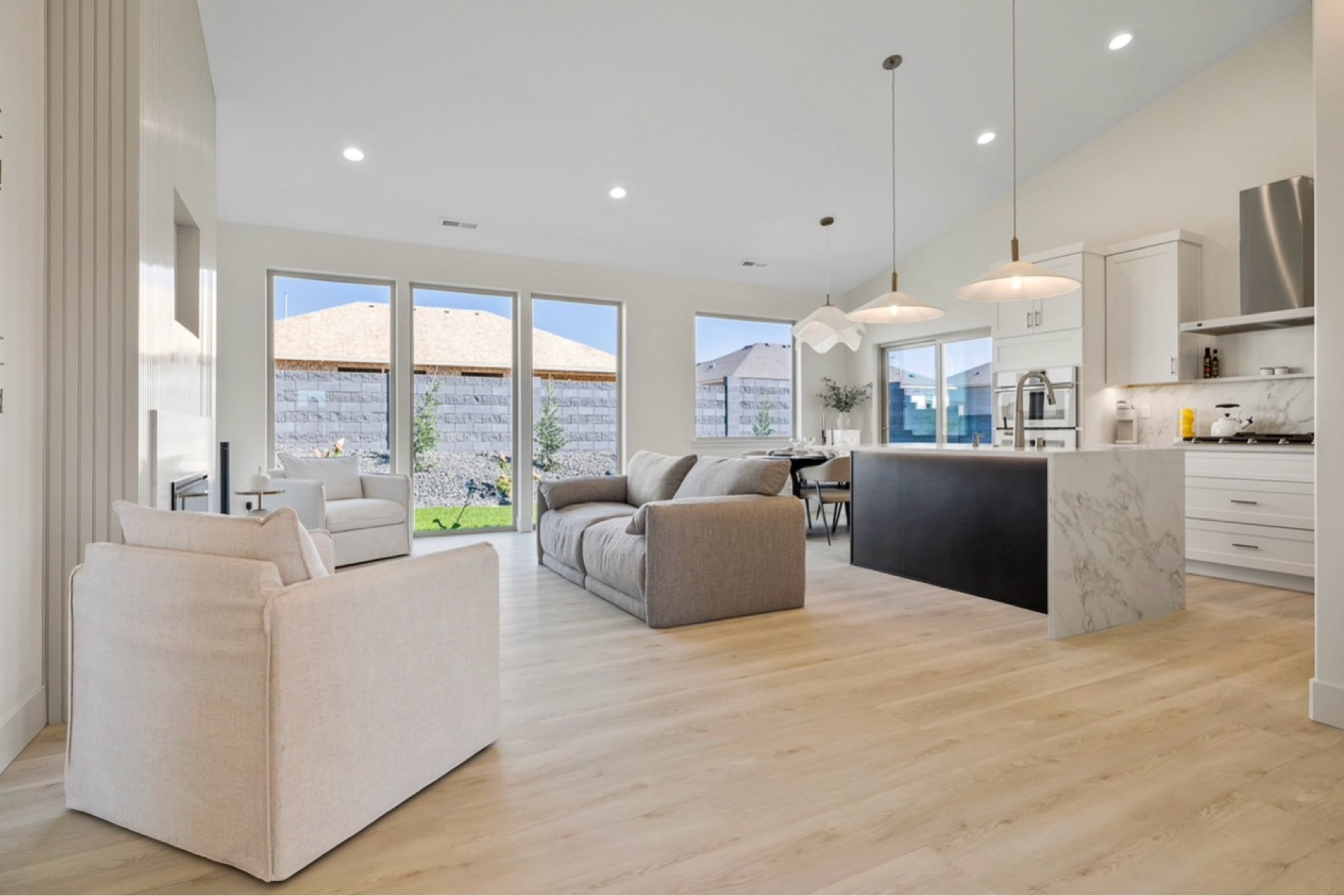 Samsung whit appliances. Samsung built in appliance. Samsung built in oven. Gray boucle sofa. West elm pendants. White west elm material pendants. White dining chandelier. Black dining table. Beige dining chairs. Whit accent chair. Crate and barrel lighting  

#LTKFallSale #LTKActive #LTKCon