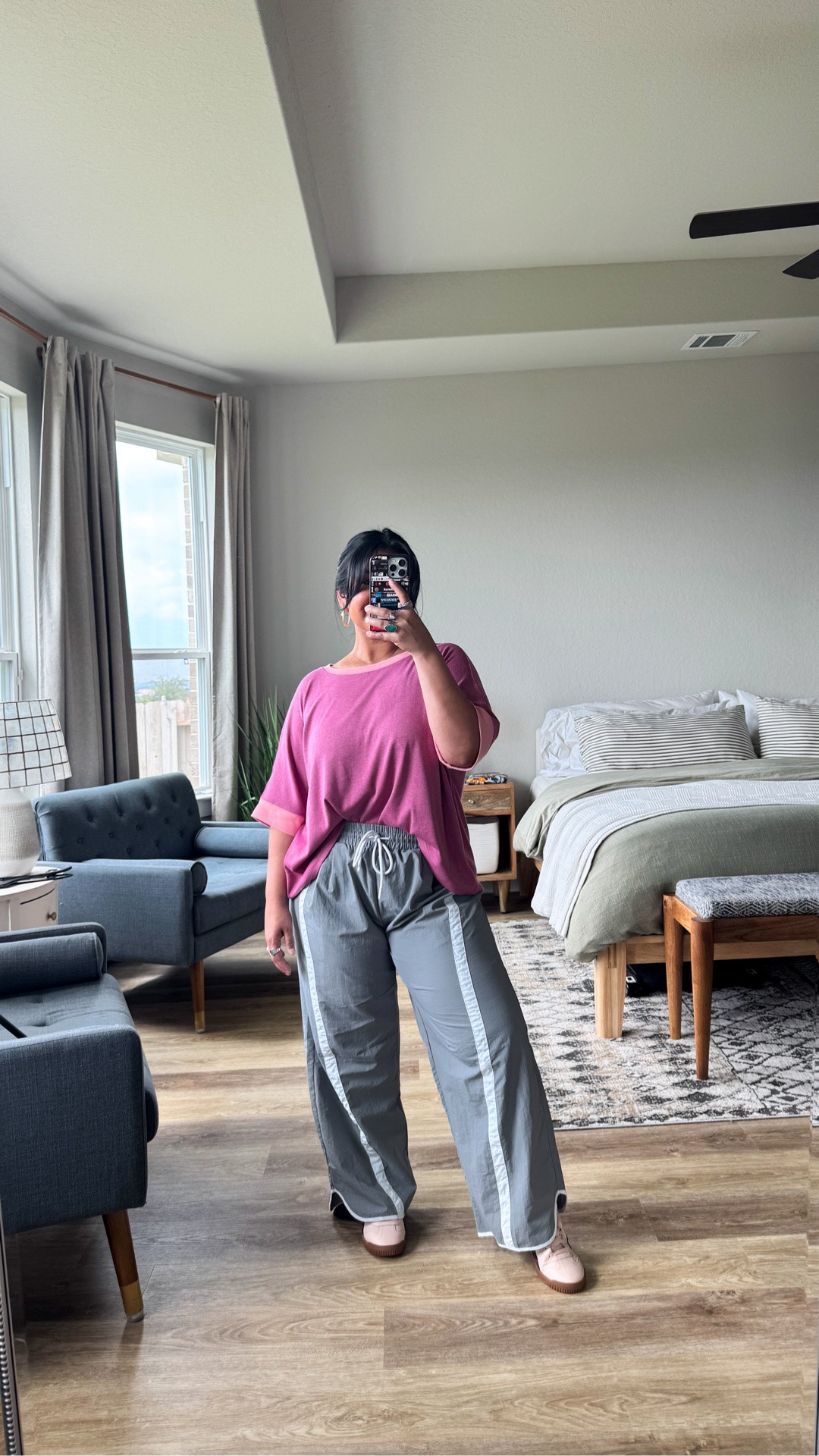 I'm 5'1" size 12 // TOP: wearing a size L, perfectly oversized, shorter in the front and longer on the sides so it's great for front tucking // PANTS: these run a little small, so I sized up to an XL, these are a windbreaker material // shoes are true to size

#LTKootd #LTKPetite #LTKMidsize