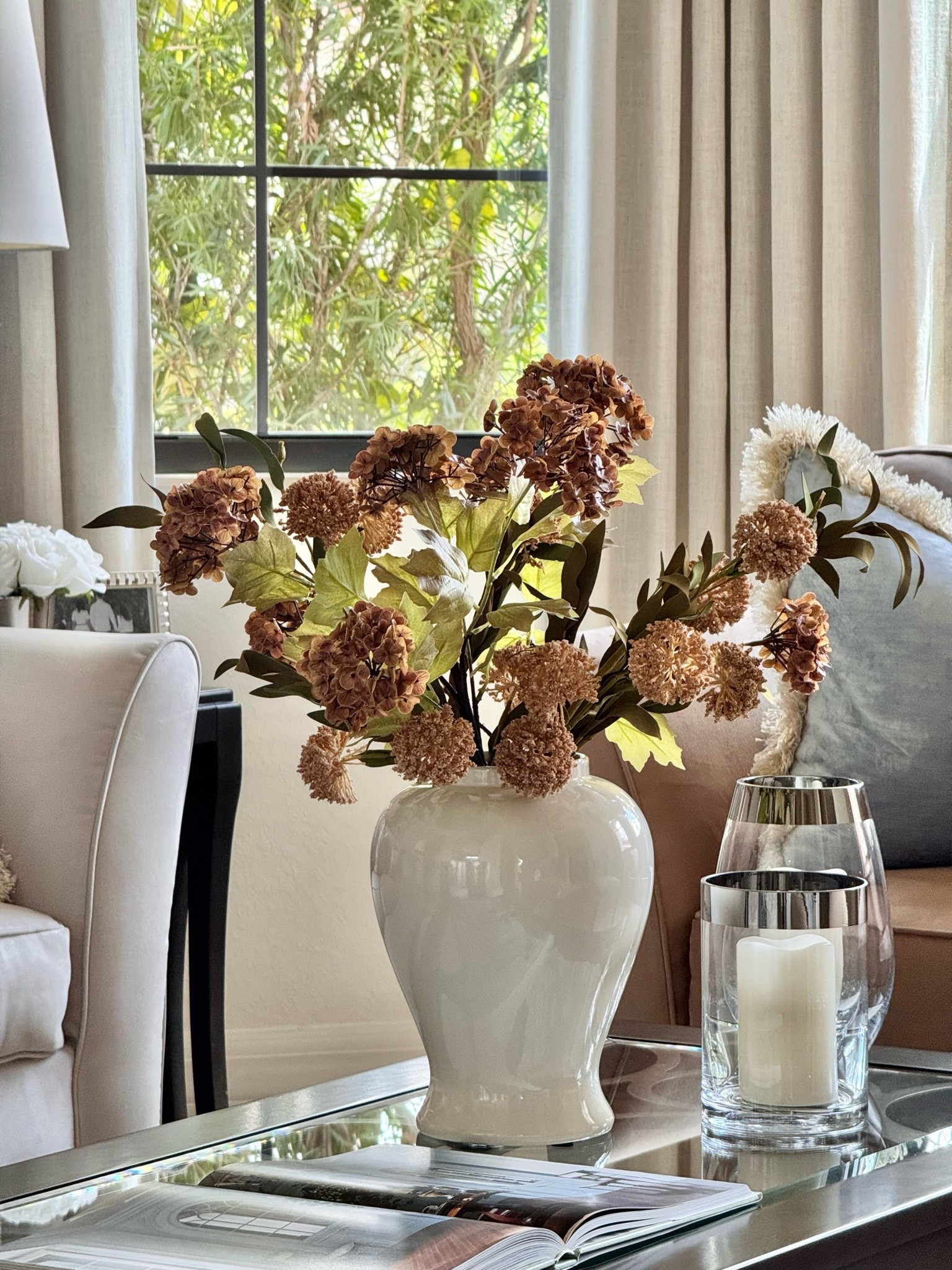 Moody, elegant, and effortless fall centerpiece!🍂. I used two of each stems to create this stunning centerpiece for our coffee table!🍂🍂

Fall Decor | Transitional Decor | Neutral Decor | Autumn Decor | Fall Stems & Florals | Faux Hydrangeas | Seasonal Decor | Home Decor | Fall Centerpiece | Throw Pillow Covers | Drapes | Wall Sconces | Coffee Table Book

#LTKHome #LTKSeasonal