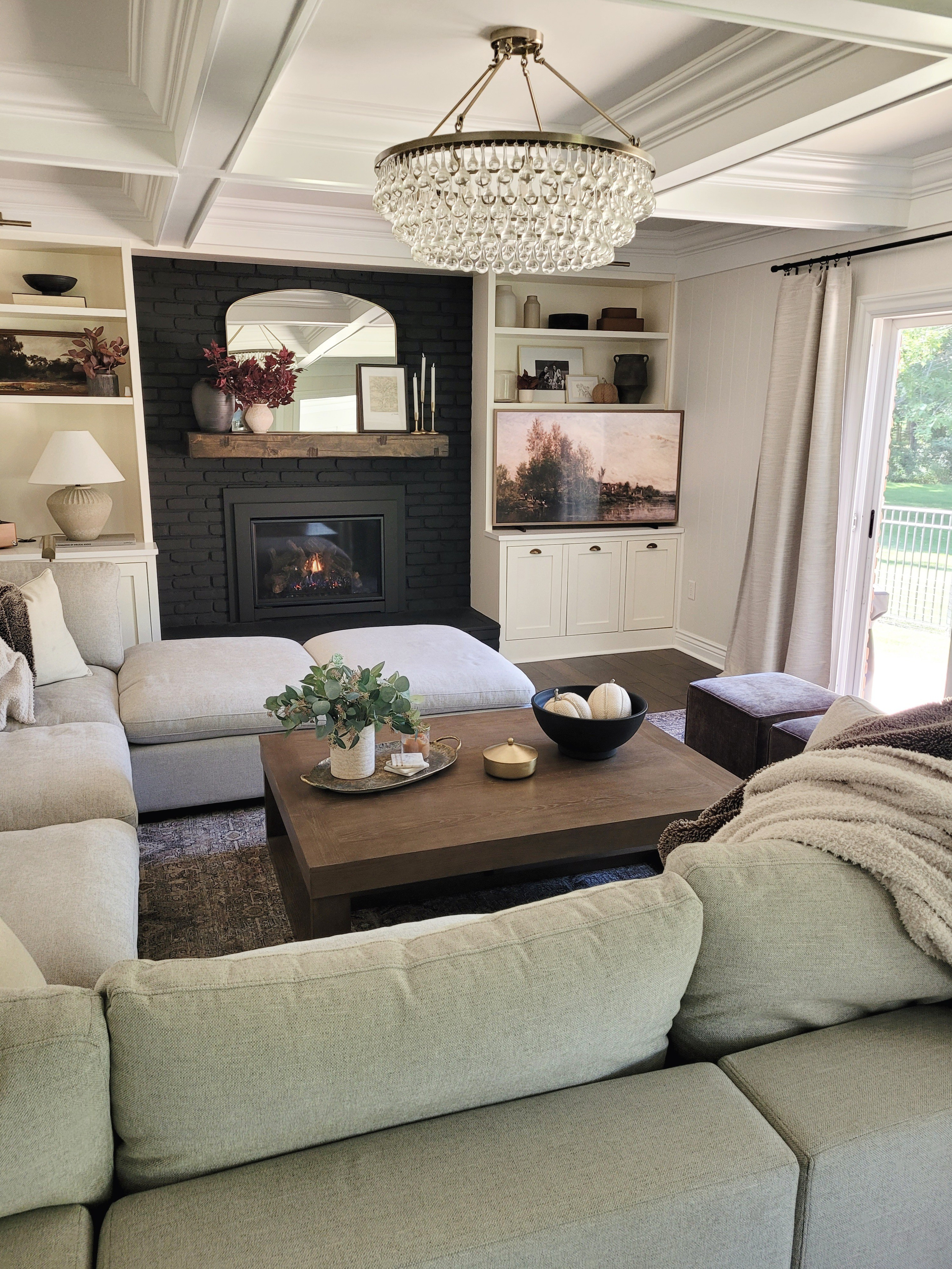 Fall family room, fall living room,  fall decor,  black fireplace,  mantle,, shelf styling,  coffee table,  built ins,  table lamp

#LTKHome #LTKSeasonal