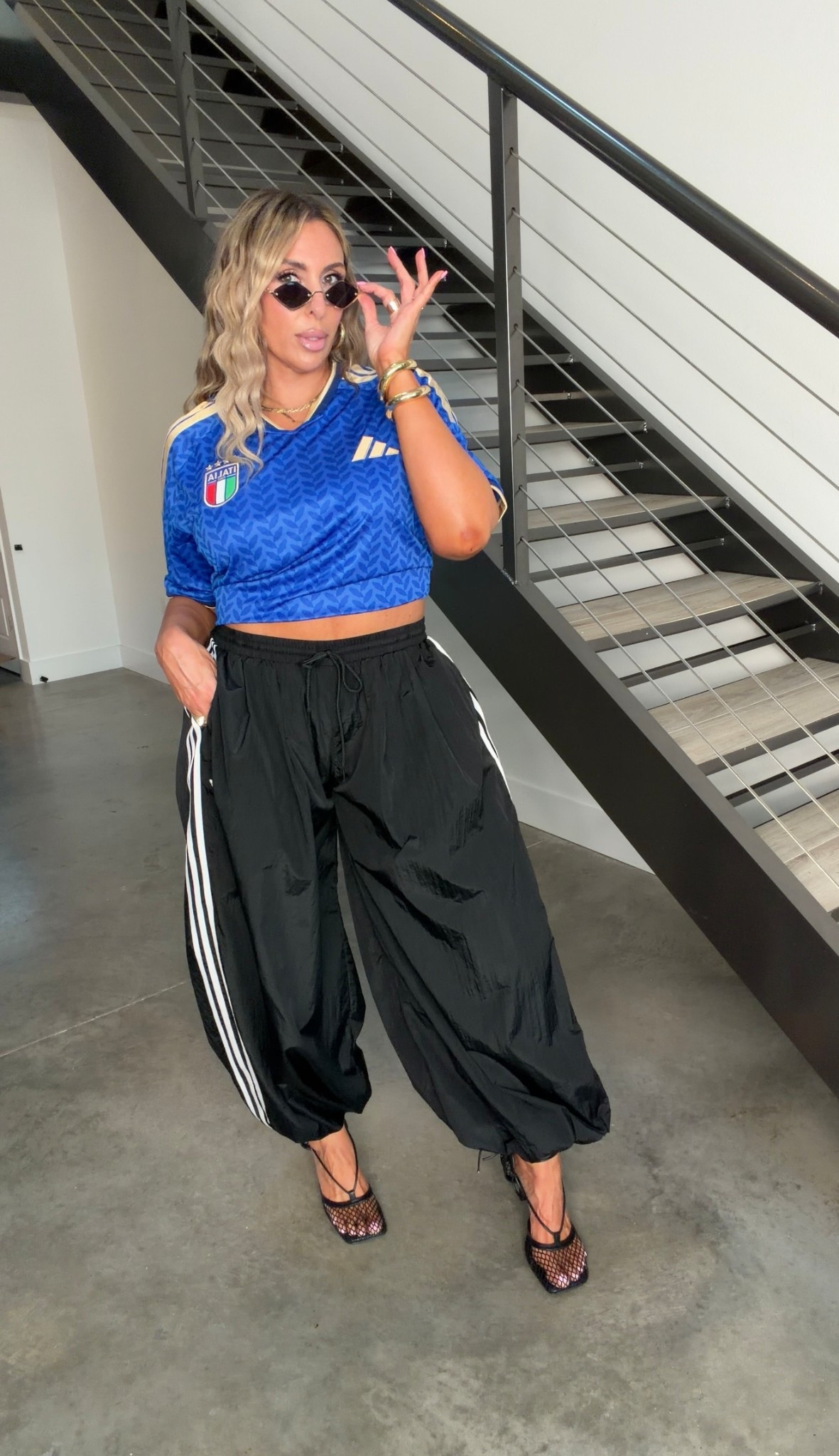 Styling inspo for the FIFA World Cup 2026™ jersey ⚽️✨ 

Black Bubble Track Pants L

Italy men’s jersey XL tied up in the back (the fit was loose I will need a size up for a oversized fit)

Lace Up  Flats (true to size and comfortable)

Linked other jersey options

#fifa #worldcup
#LTKMidsize #LTKActive