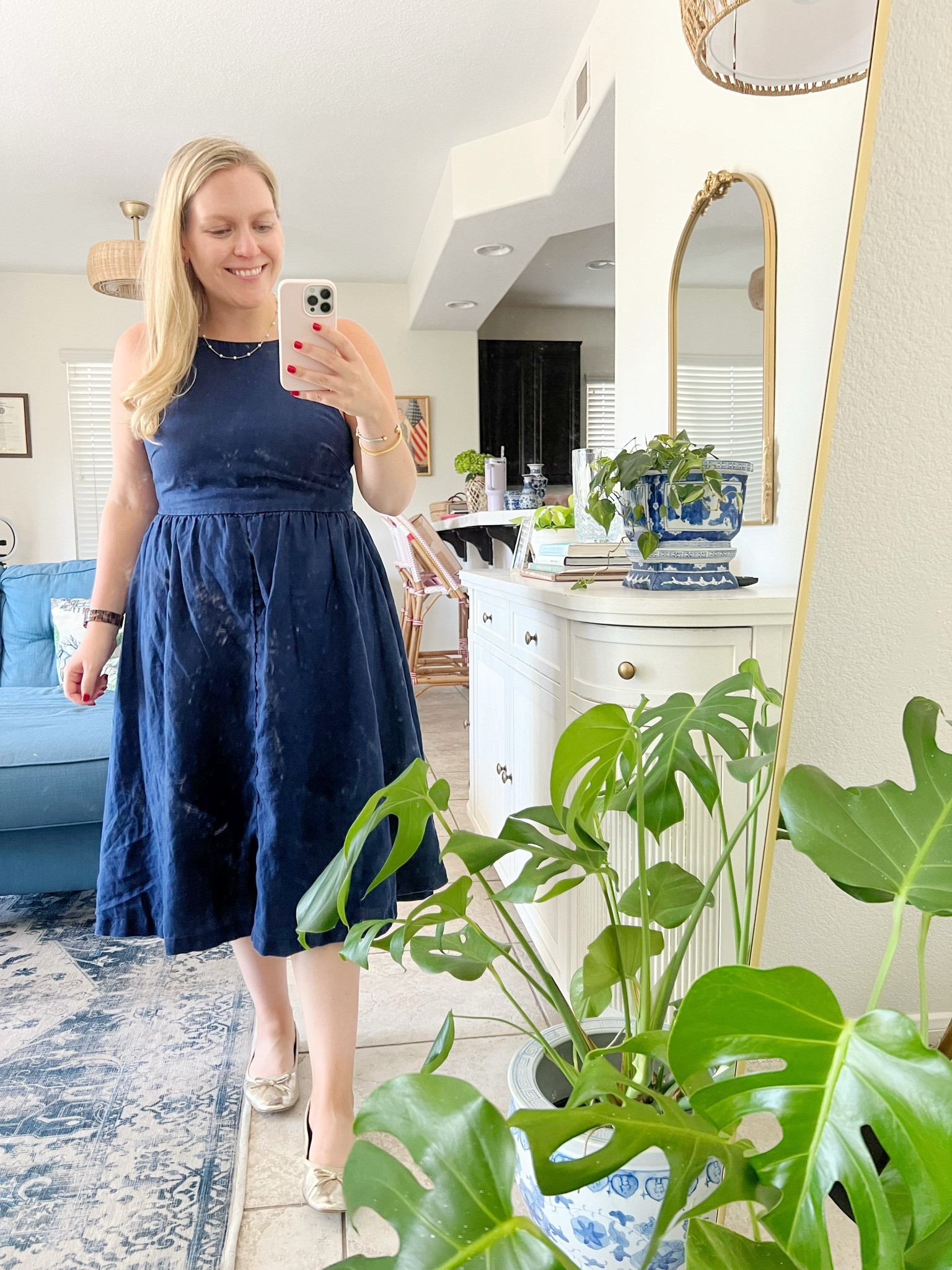 Ignore the dirty mirror, focus on the cute maternity outfit! 

This Lands End halter dress is amazing and I wore it so often during the summer even before I was pregnant  

#LTKBump #LTKStyleTip #LTKFindsUnder100