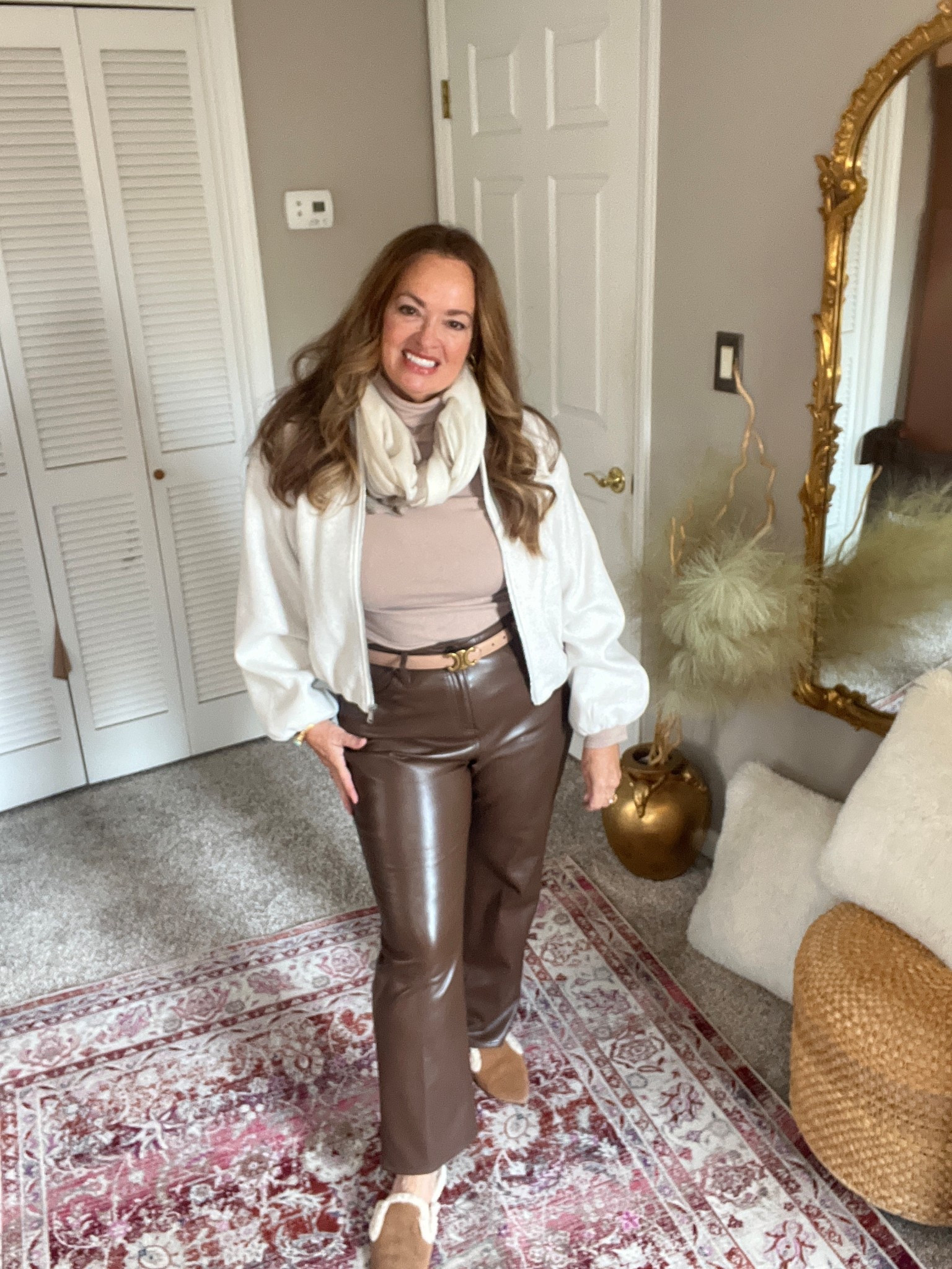 Wool and faux leather. 

#LTKmorningroutine #LTKHoliday #LTKootd