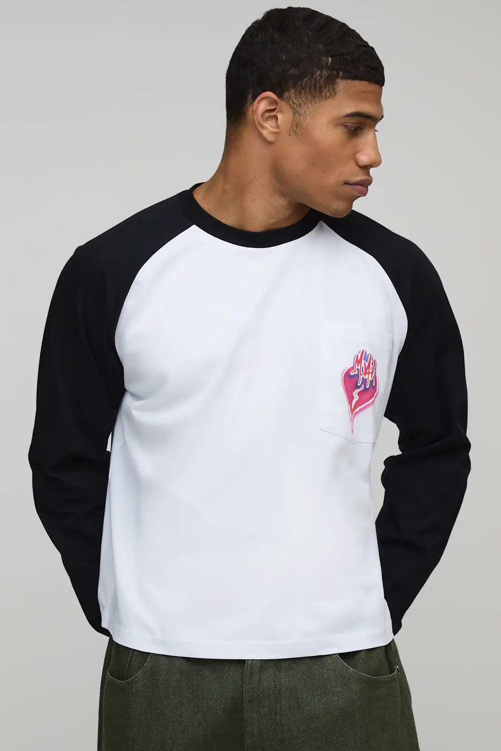 Black boohooMAN Regular Fit Boxy Graffiti Heart Printed Raglan T-Shirt | Boohoo | Boohoo.com (UK & IE)