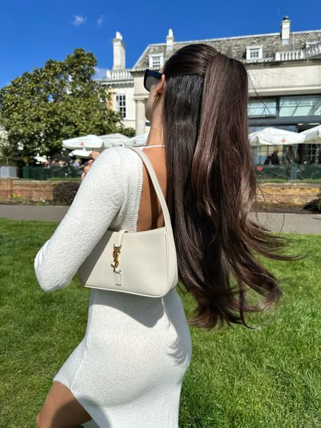 Love a knitted, backless white midi dress for the spring. 

#LTKunder50