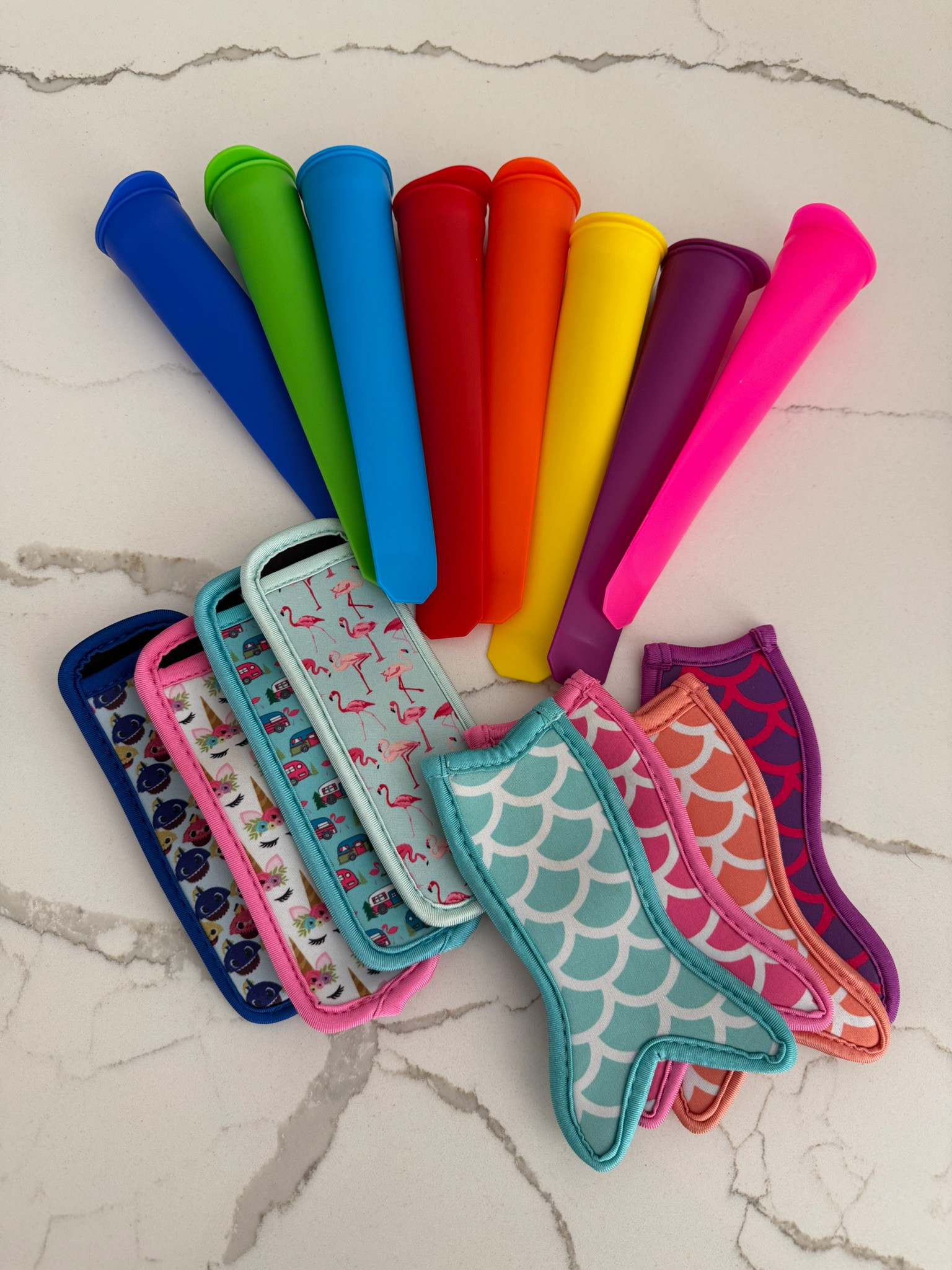 Summer necessities ☀️

Ice pop molds + sleeves to keep them cold without freezing your hands

Perfect for kids and hot days 🫶



popsicles, sweet treat, silicon, mermaid tails, print, summer 2026, carla.bushey 

 #LTKmomlife #LTKSeasonal #LTKKids