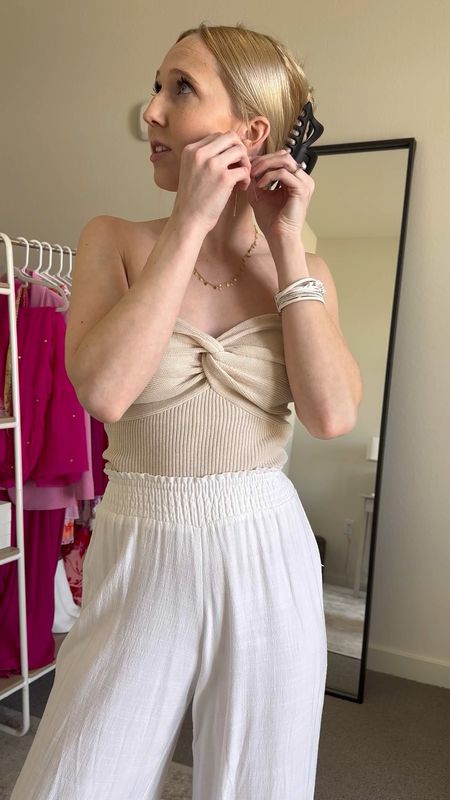 Vacation Outfit! ☀️🏝️ If you’re headed somewhere warm for Spring break, you’ll want to pack this Amazon strapless tank and gauzy white beach pants ☺️

This twisted knot tank fits true to size, I’m in an XS. It has great quality fabric, leaning on the thicker side. Wearing an XS in the white linen pants as well.

Vacation outfits, resortwear, spring break outfits, vacation outfit, resort wear, spring outfit, vacation wear, spring break 2024, college Spring break, Target sandals, Target shoes, summer shoes, beach day outfit, beach outfit, beach vacation outfit, casual spring outfit, elevated vacation outfit, vacation dinner outfit #vacationoutfitsbeach #vacationlooks #beachdayoutfit

#LTKsalealert #LTKswim #LTKfindsunder50