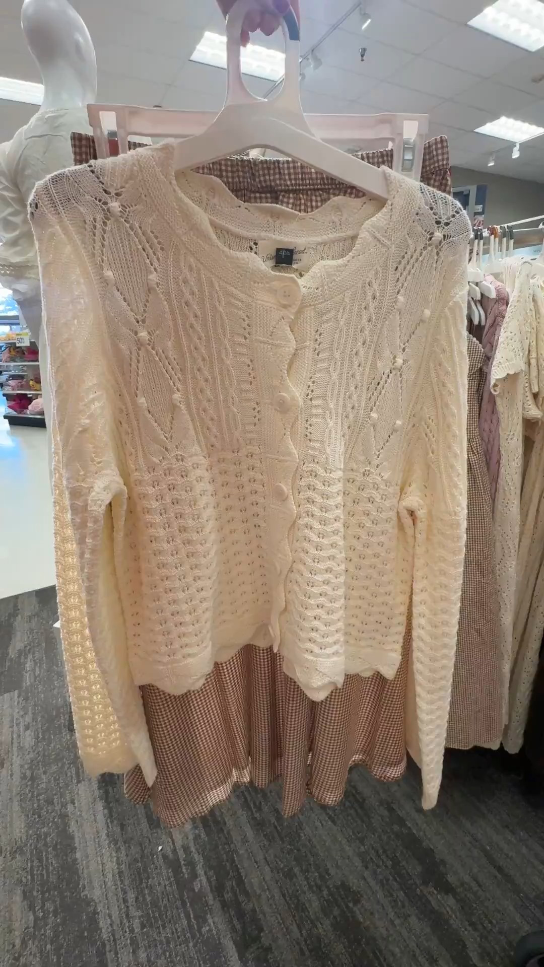 This open knit cardigan is so pretty! Paired with a brown gingham midi skirt!

#LTKgrwm #LTKWorkwear