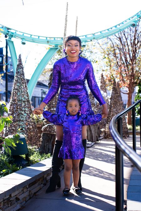 Found the best moment to twin with my mini Nova. How beautiful is this sequin purple dress. Mommy and me moment under $50…yep, get it asap because this will be gone in blink. It also comes in a green pair. All from @Walmartfashion 

#ad #Walmartfashion
#holidayoutfit #kneehighboots

#LTKunder50 #LTKHoliday #LTKSeasonal