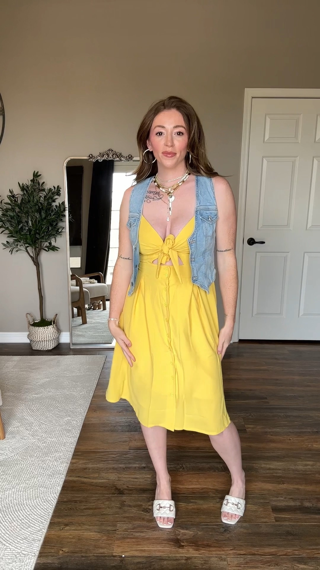This yellow summer dress (under $50) is a staple in my summer wardrobe. Watch how I style it with a mesh overlay and sandals for a relaxed look, add a shawl for a breezy evening, or throw on a denim vest to give it a casual edge.

#LTKFindsUnder50 #LTKStyleTip