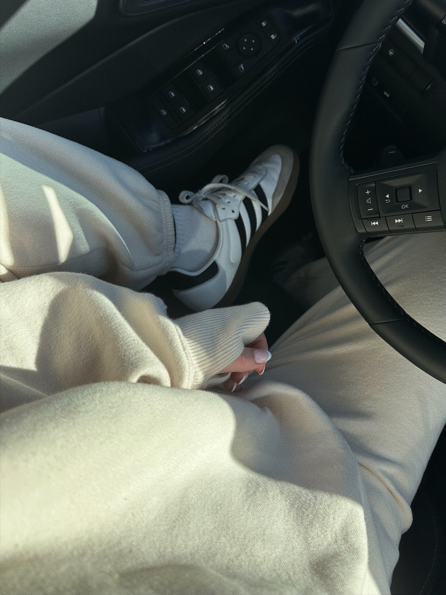 I did a medium in the top and a small in the bottoms! I usually size down in sweats but they do fit TTS! top is super long and covers your bum with leggings! 