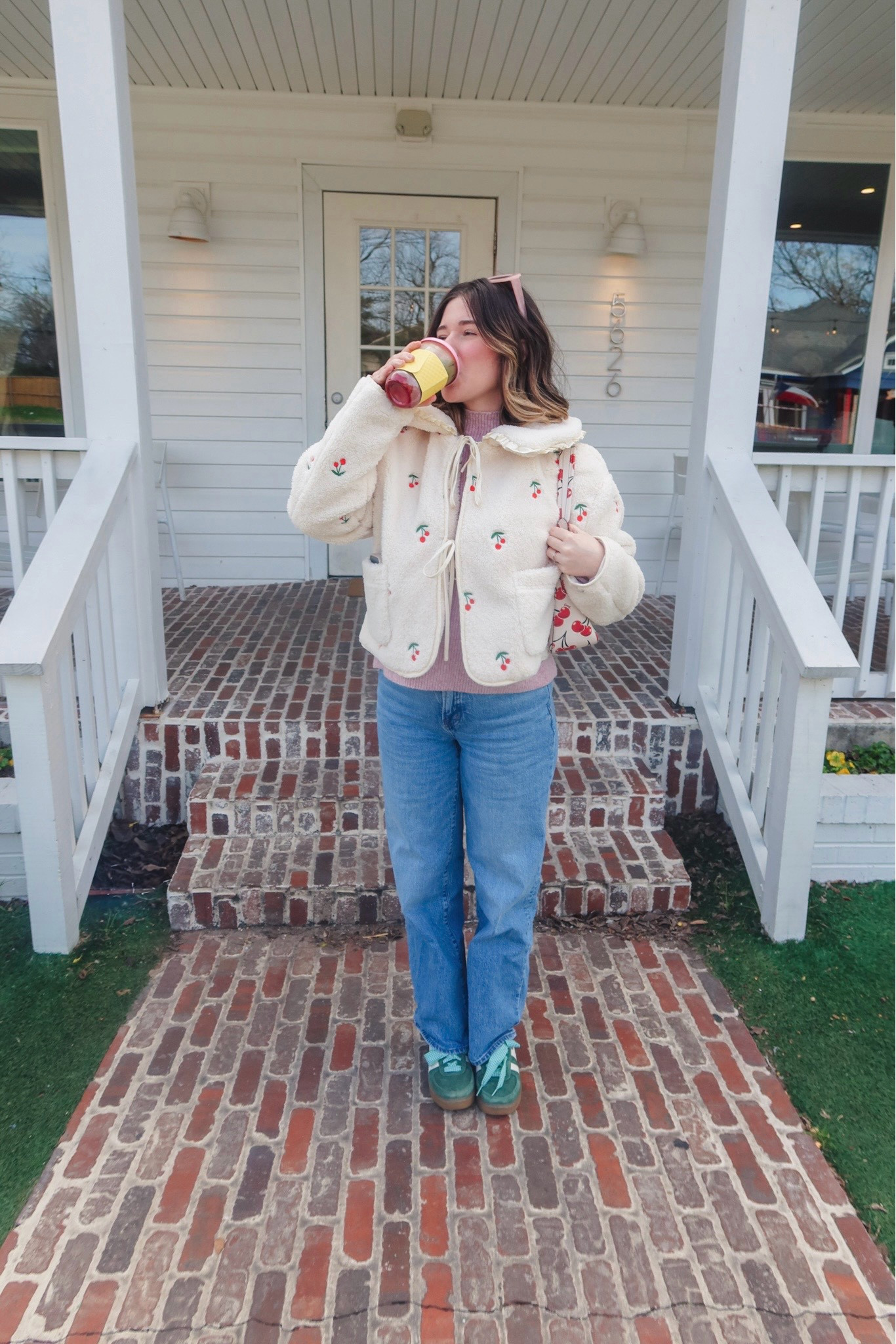 Daily outfit 
Anthropologie cherry jacket
Abercrombie purple sweater with mock neck 
Madewell 90s straight jeans 
Gola sneakers
Anthropologie ribbon laces
Coach cherry tabby purse 
Amazon pink retro glasses

#LTKItBag #LTKStyleTip #LTKShoeCrush
