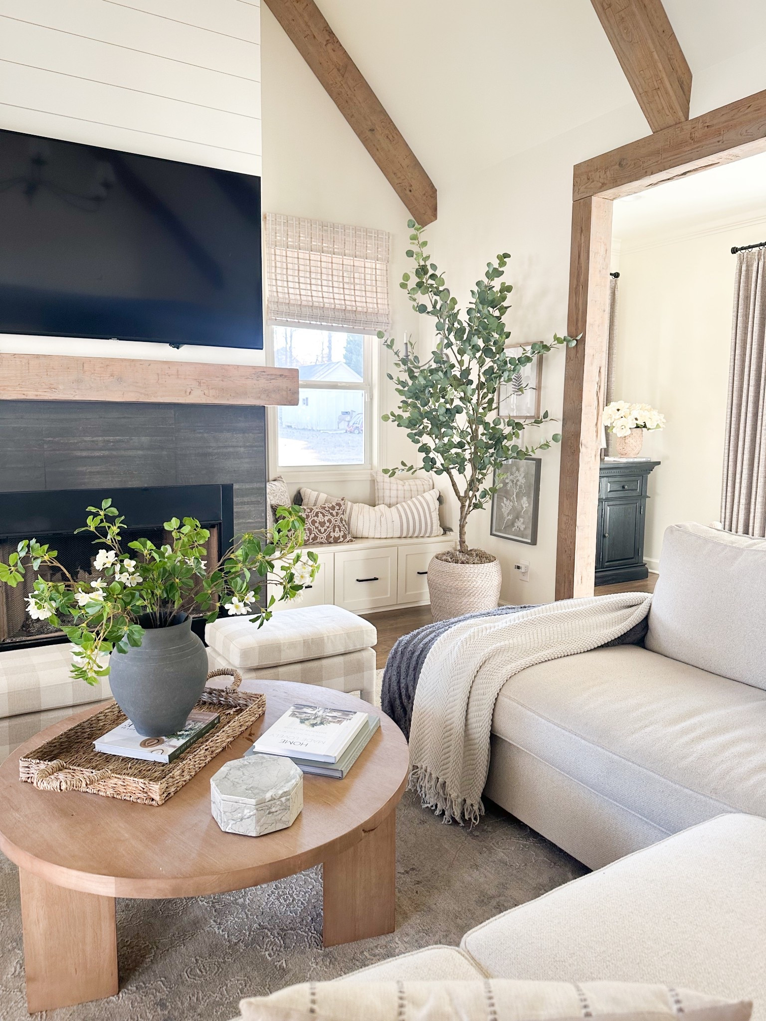 Living room decor, home decor, modern classic, transitional home, ottoman, coffee table, sectional sofa, Roman shades, faux tree 

#LTKStyleTip #LTKHome #LTKSaleAlert