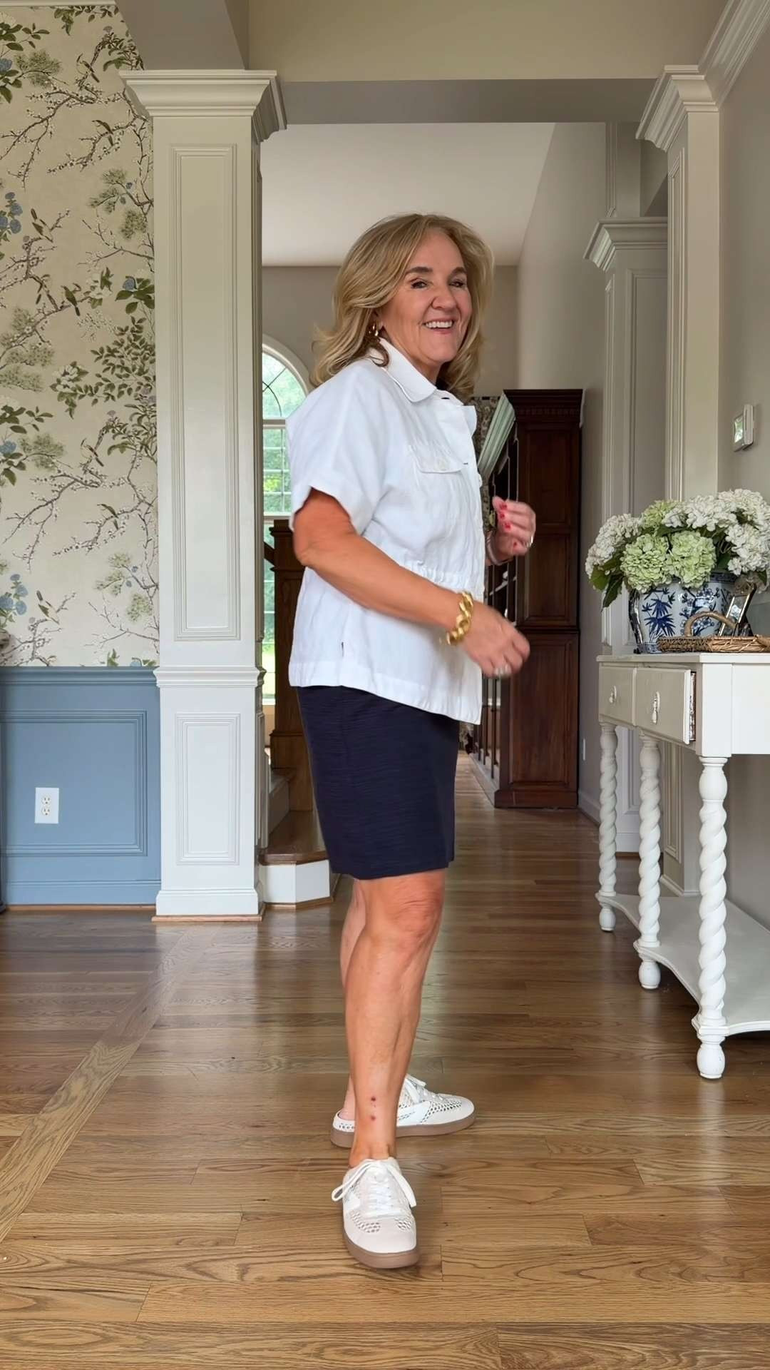 This lightweight white utility-style jacket paired with a simple navy dress and sneakers is such a chic everyday look. 
Comfortable, polished, and so easy to recreate all summer long. 

Easy summer layering done right 🫶🏻 

 #LTKootd #LTKOver40 #LTKSaleAlert