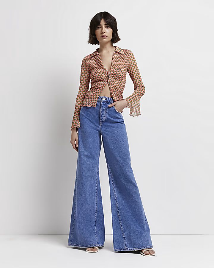 Blue high waisted ultra flared jeans | River Island (UK & IE)