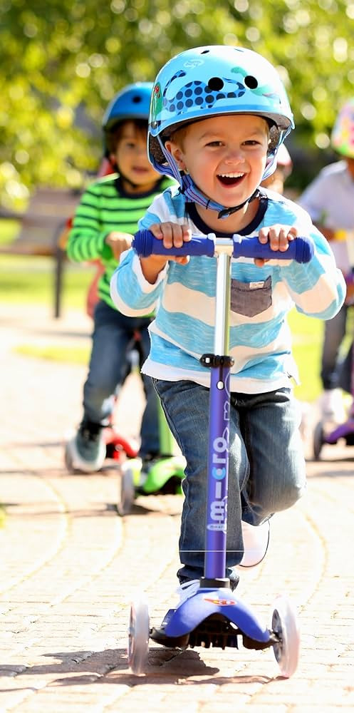 Micro Kickboard - Mini Deluxe - Three Wheeled, Lean-to-Steer Swiss-Designed Micro Scooter | Amazon (US)