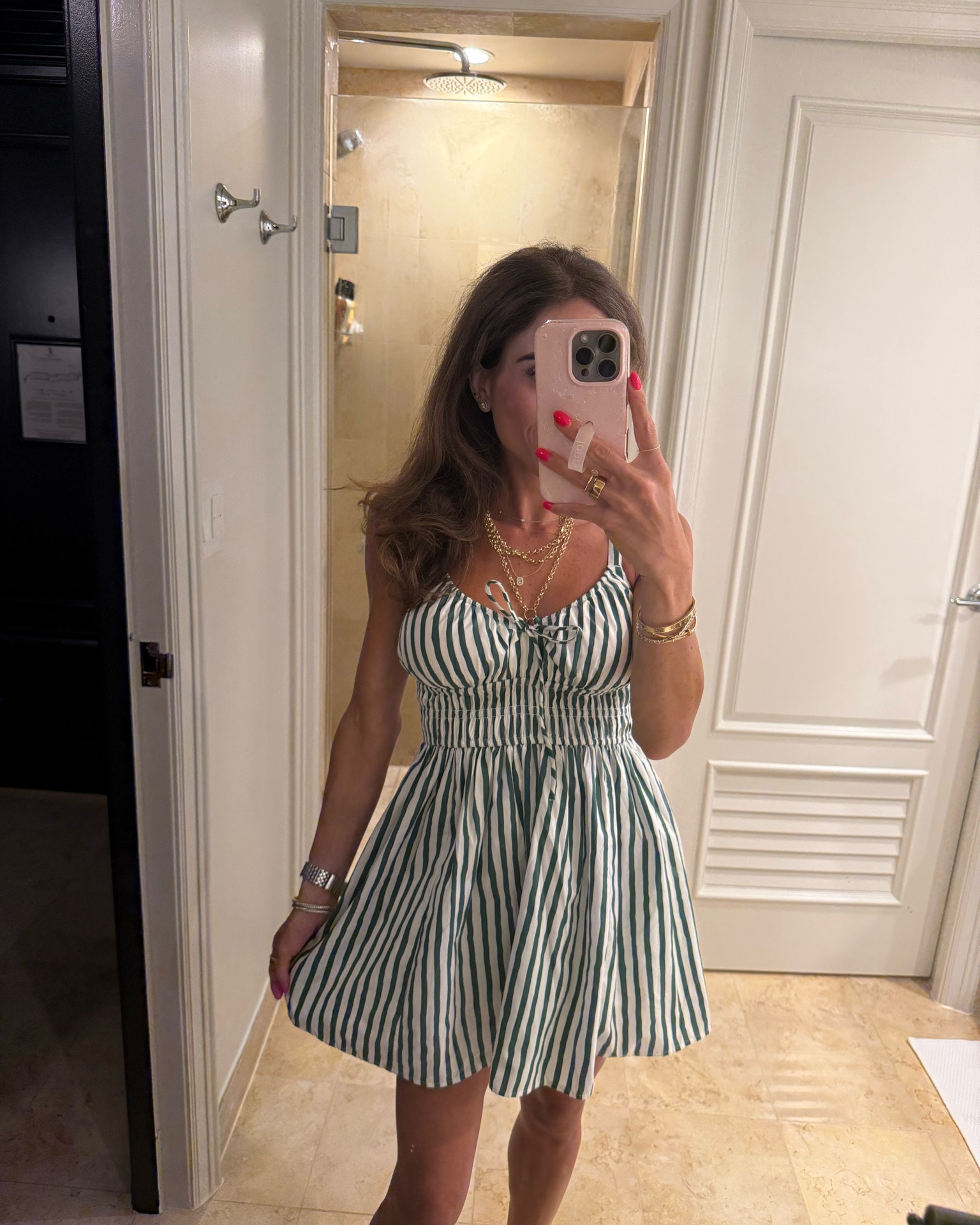 Green and white stripe mini dress with built in bra and shorts. Wearing xxs petite 
On sale and perfect for vacation

#LTKSaleAlert #LTKTravel #LTKPetite
