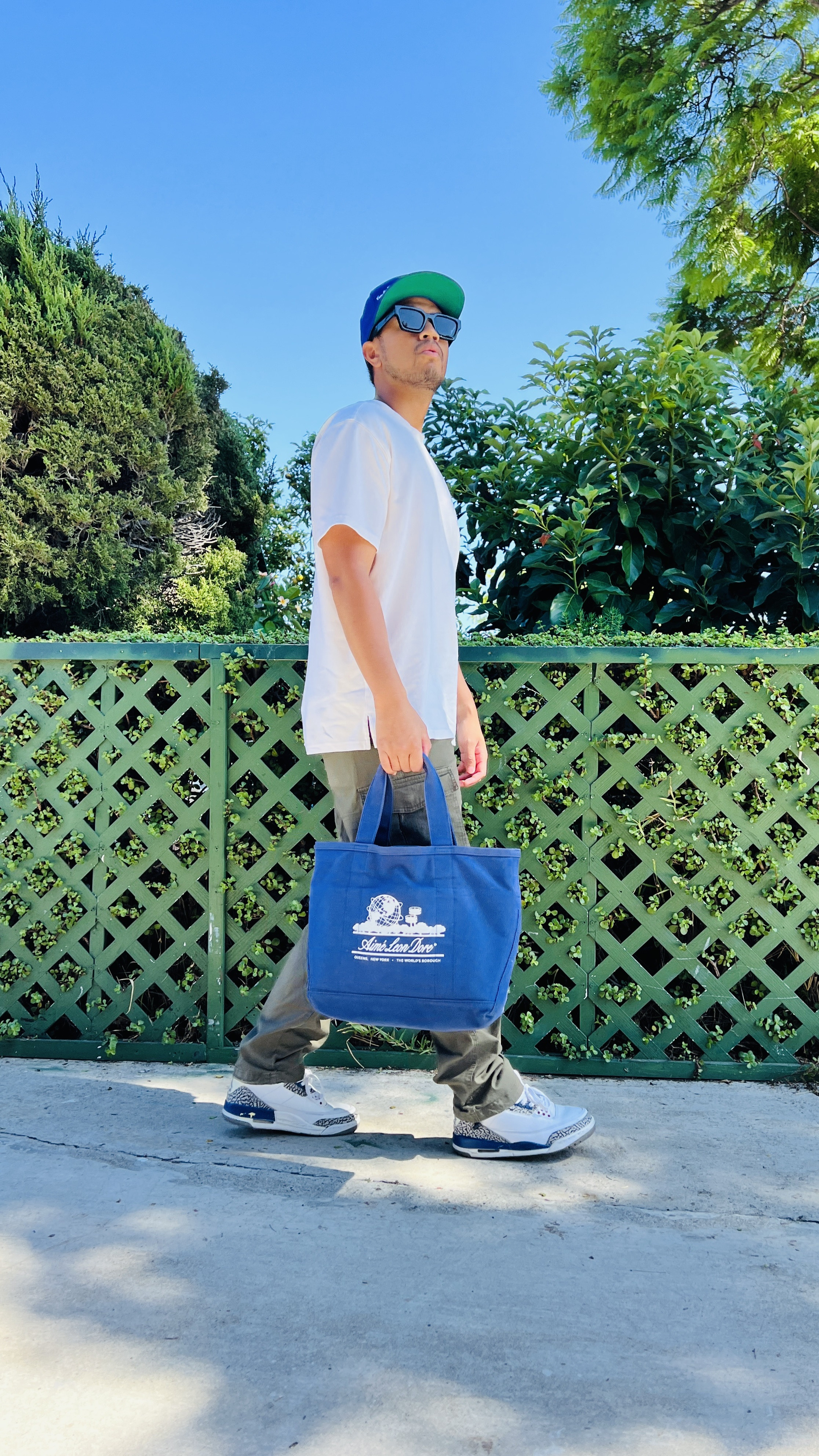 men's casual fashion, fall men's style, Uniqlo men's shirt, Nike Jordans outfit, Aime Leon Dore tote bag, Dodgers baseball cap style, men's sunglasses fashion, trendy men's fashion, streetwear men's look, autumn men's wardrobe, men's fashion accessories, relaxed men's style, men's outfit inspiration, modern men's clothing, everyday men's fashion

#LTKMens #LTKShoeCrush