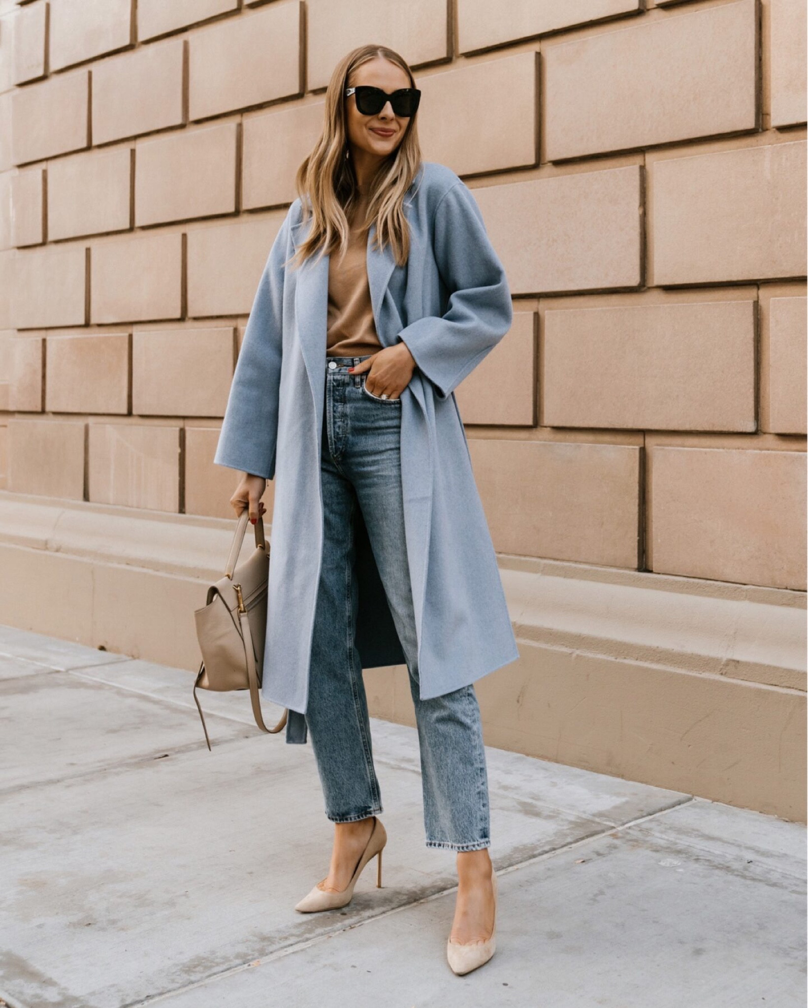 Fashion Jackson wearing blue coat (similar), tan sweater, AGOLDE jeans, nude pumps, transitional outfit, business casual #fashionjackson #jeans  

#LTKstyletip #LTKunder100 #LTKworkwear