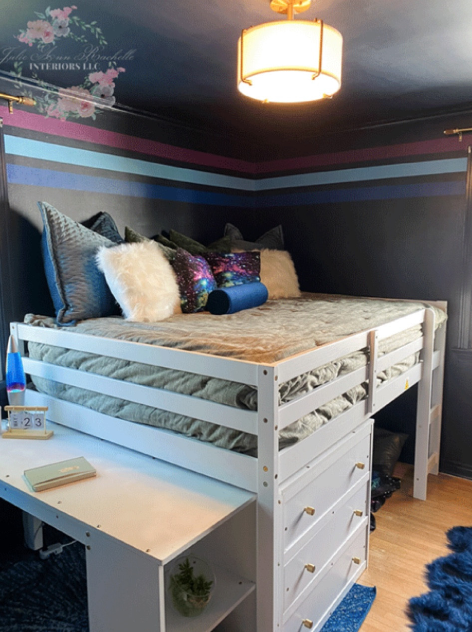 This room makeover was all about creating a space that truly reflects my nephew’s style and personality. He wanted a moody, navy blue color-drenched room—right on trend! We brought his vision to life, adding bold stripes that perfectly complement his galaxy-themed pillows. The result? A cozy, inviting space where he loves to unwind, especially in his comfortable loft bed that feels like his own little retreat.

This transformation was also my ORC WEEK 8 Challenge reveal on julieannrachelle.com. From the functional rollout desk to the sturdy drawer set, every detail was designed with both style and practicality in mind. Check out the full reveal on the blog, and don’t forget to follow my LTK for more inspiring design ideas that turn dreams into reality! ✨ #ORC #MoodyInteriors #TeenBedroom 

1. Moody Interiors
2. Navy Blue Room
3. Teen Bedroom Makeover
4. Galaxy Pillows
5. Cozy Loft Bed
6. Trending Room Colors
7. Striped Wall Design
8. Functional Furniture
9. ORC Challenge
10. LTK Home Decor#LTKBacktoSchool 

#LTKHome #LTKFindsUnder50 #LTKMens