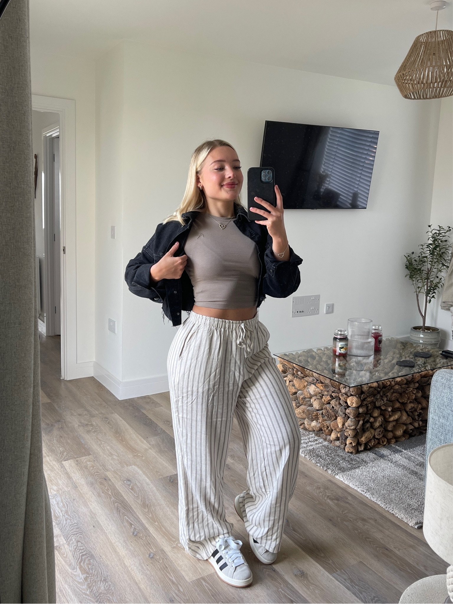 Jacket is Topshop - raw cropped denim jacket 
Crop top is Oner Active - Minky wearing a size small
Stripe trouser wearing a size Medium petite length 