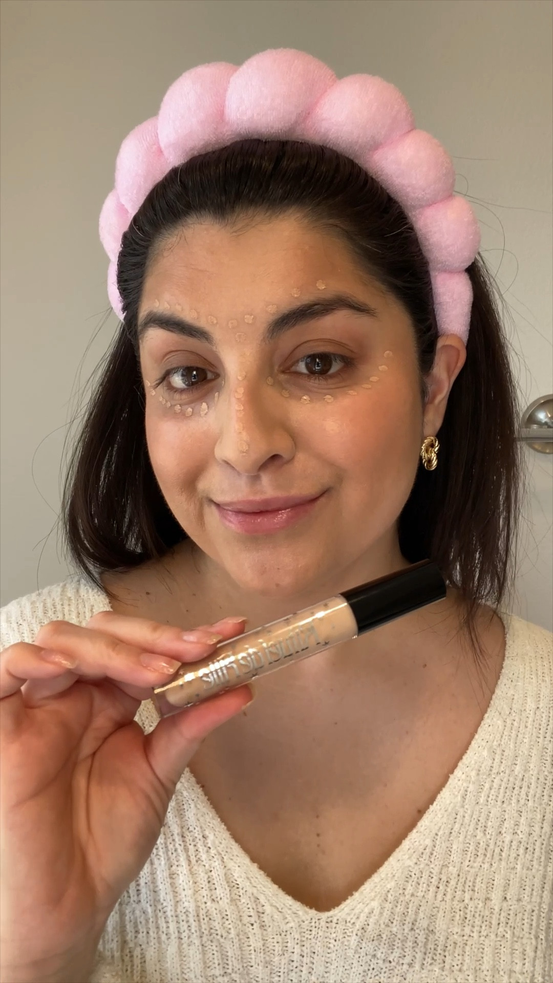 Wearing shade SPELL 126 light skin tone with warm peach undertones. 

I love the creamy texture of the formula and that it feels weightless on my skin. I love this concealer because it is a light-weight buildable medium coverage formula with a natural finish and it feels like second skin. A little goes a long way. The texture is rich and creamy. It blends beautifully as I work the product into my skin. The formula does dry quickly, so I recommend applying in small areas and then blending immediately. It offers amazing coverage for blemishes and  to brighten my under eye. I’m building the concealer from medium coverage to full coverage and it looks very natural and not cakey. This has become my favorite go-to concealer for everyday – running errands, going to pilates, or for nights out! 

#gifted #ritueldefille #bestconcealer #concealerreview #ritueldefilleconcealer #softsorceryconcealer 

#LTKBeauty #LTKGiftGuide #LTKCyberWeek