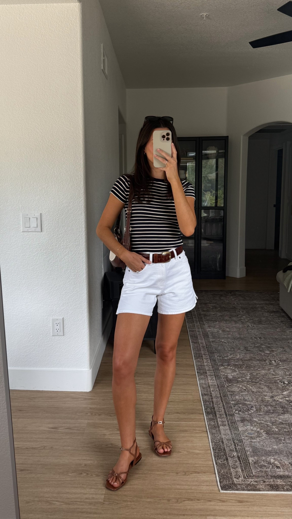 Outfit of the day! My belt is thrifted, I’m linking a similar one! I’m 5’7” wearing true size 25 curve love in the shorts and a small in the Sezane tee shirt! The sandals are adorable, but they took a couple of wears to break in before they became comfy! 

#LTKSeasonal #LTKFindsUnder100 #LTKStyleTip