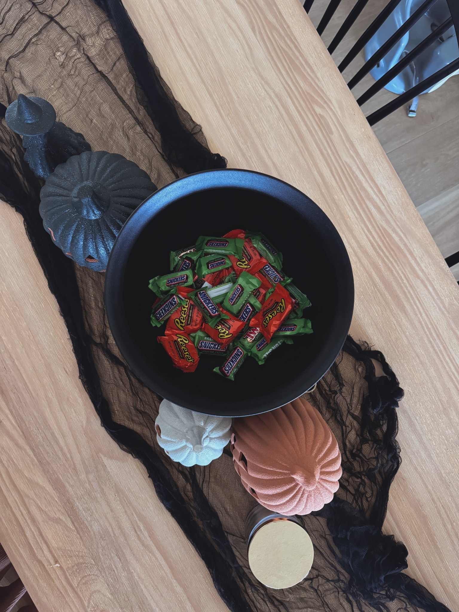 The cutest Target find for spooky season 👻 A simple black cauldron that doubles as the perfect candy bowl for your table or entryway. Linking it + similar Halloween decor! #TargetHome #HalloweenDecor #LTKHome