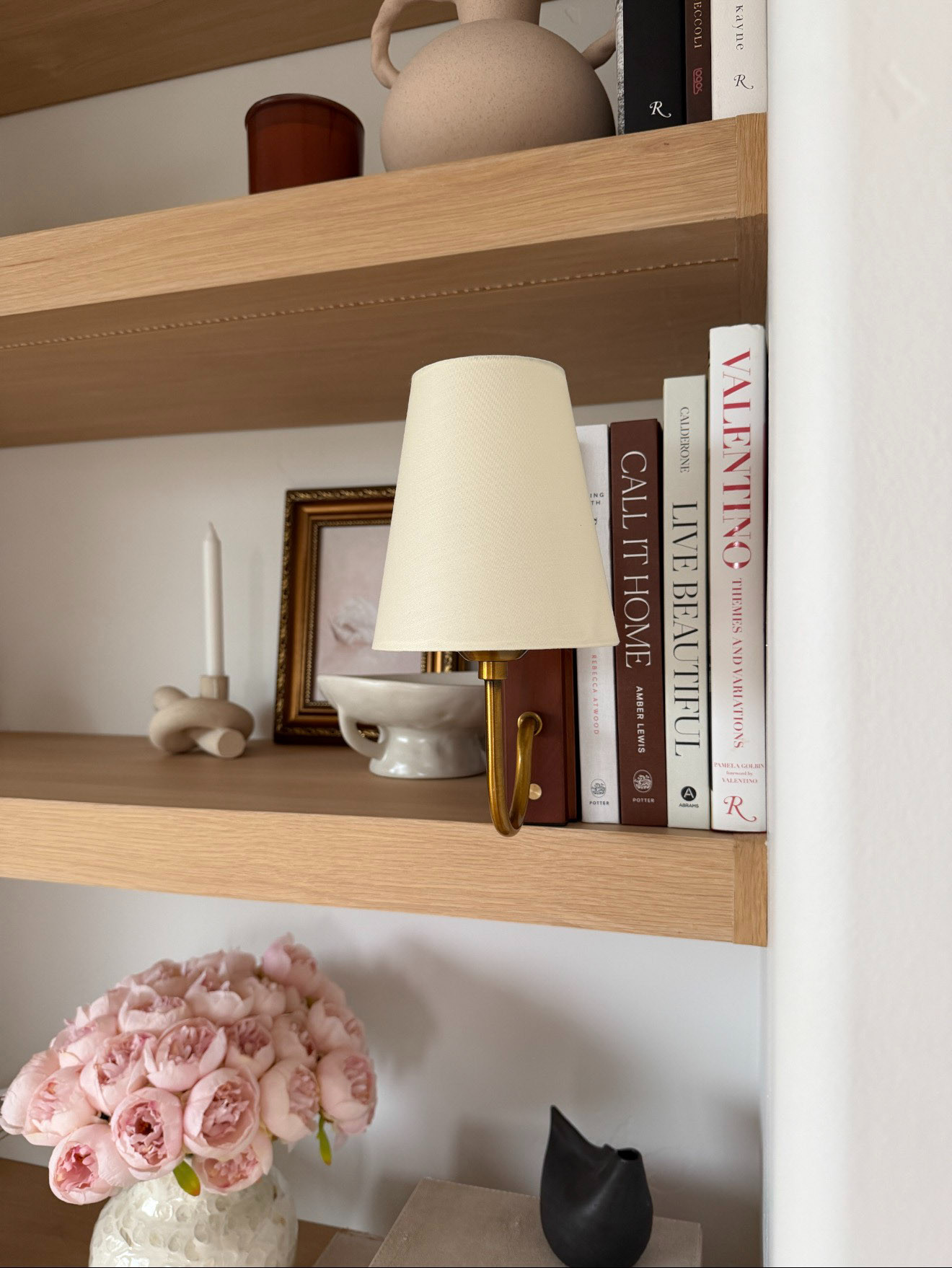 Add cozy ambient lighting to any bookshelf with this stunning bookshelf lamp! It creates atmospheric illumination that gives that special touch with minimal effort!  

 #LTKHome