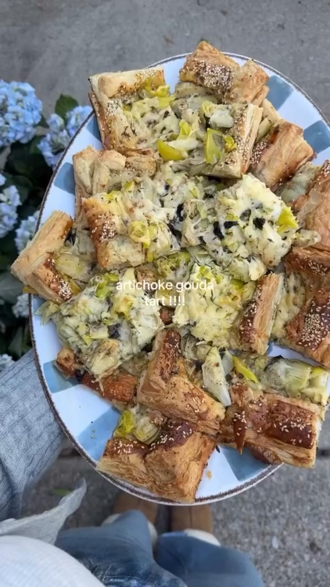 Today’s recipe: the artichoke gouda tart from @halfbakedharvest 

ingredients:
+ 2 sheets puff pastry
+ 1 egg
+ sesame seeds & pepper
+ 1 c gouda cheese
+ 1 c fontina cheese
+ peppercinis
+ 1/4c basil
+ 2 tbsp thyme
+ 3 garlic cloves
+ 1 tbsp lemon zest 

#LTKWatchNow #LTKHome