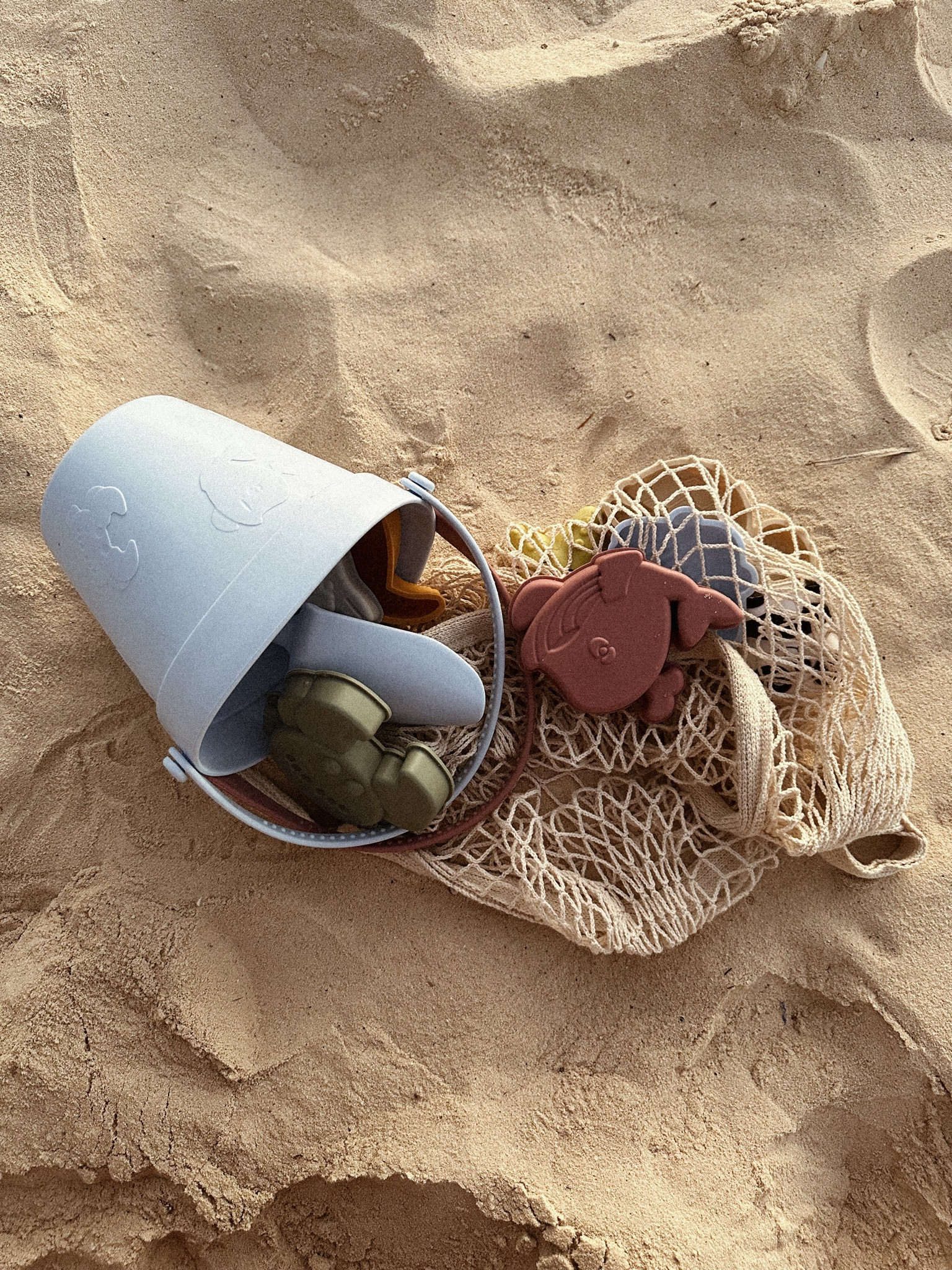 beach sand toys set - perfect silicone set to bring in a suitcase with you. 
folds up nicely, doesn’t take a lot of room. 

#LTKtravel #LTKswim #LTKkids