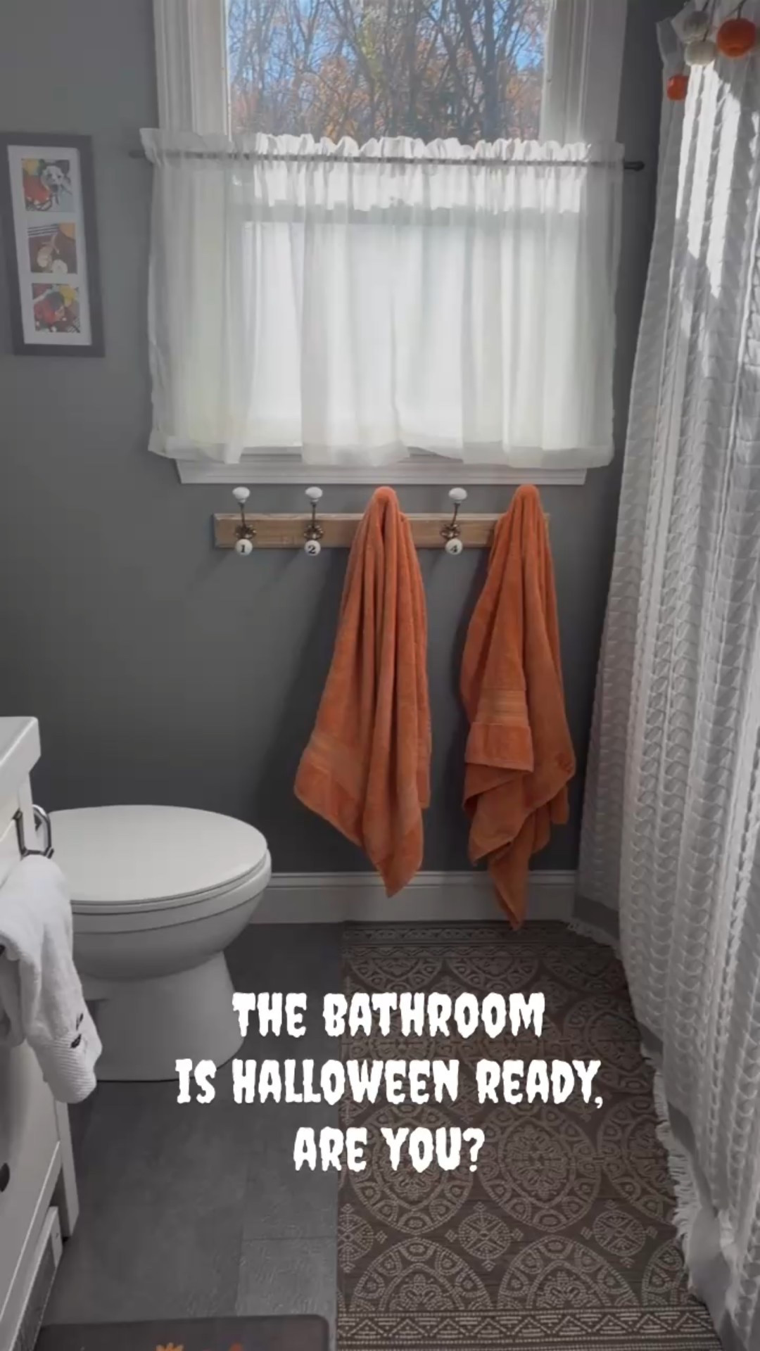 KT’s bathroom is ready for Halloween, are you?  Which detail is your favorite?  Comment below! 👻🎃🐕‍🦺🦎🧡

Quick easy ways to make a guest/family bathroom festive for any holiday!  Seasonal colored or themed towels & rug, a garland hung on shower curtain hangers & of course some pet photos!! KT has her pets wrapped in white towels for year round frame, then quickly switches out these for Halloween.  Any guesses for Christmas? 

Follow along @kmdesignanddecor23 for more holiday fun! 
.
.
.
#halloweenbathroom #guestbathroom #halloweeninstagram #ltkhome #newenglandliving #holiday #homedecorideas #ltkfamily#LTKHalloween #LTKFamily

#LTKSeasonal