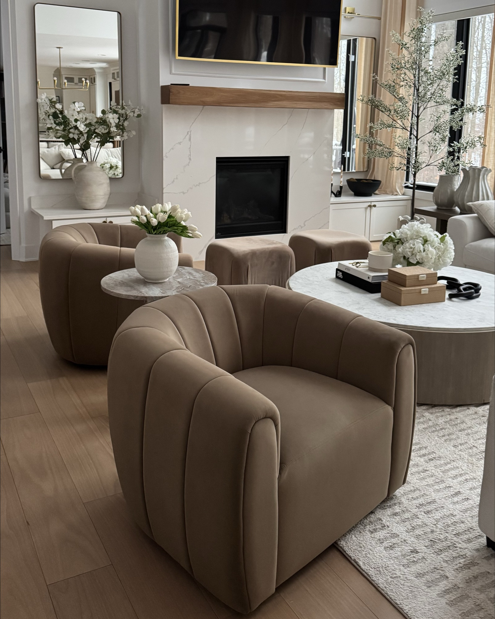 #ad Loving my new @wayfair finds including these brown velvet accent chairs, huge fluffy 8 ft olive tree, diamond tassel rug and more. #wayfair #wayfairpartner

#LTKSaleAlert #LTKHome