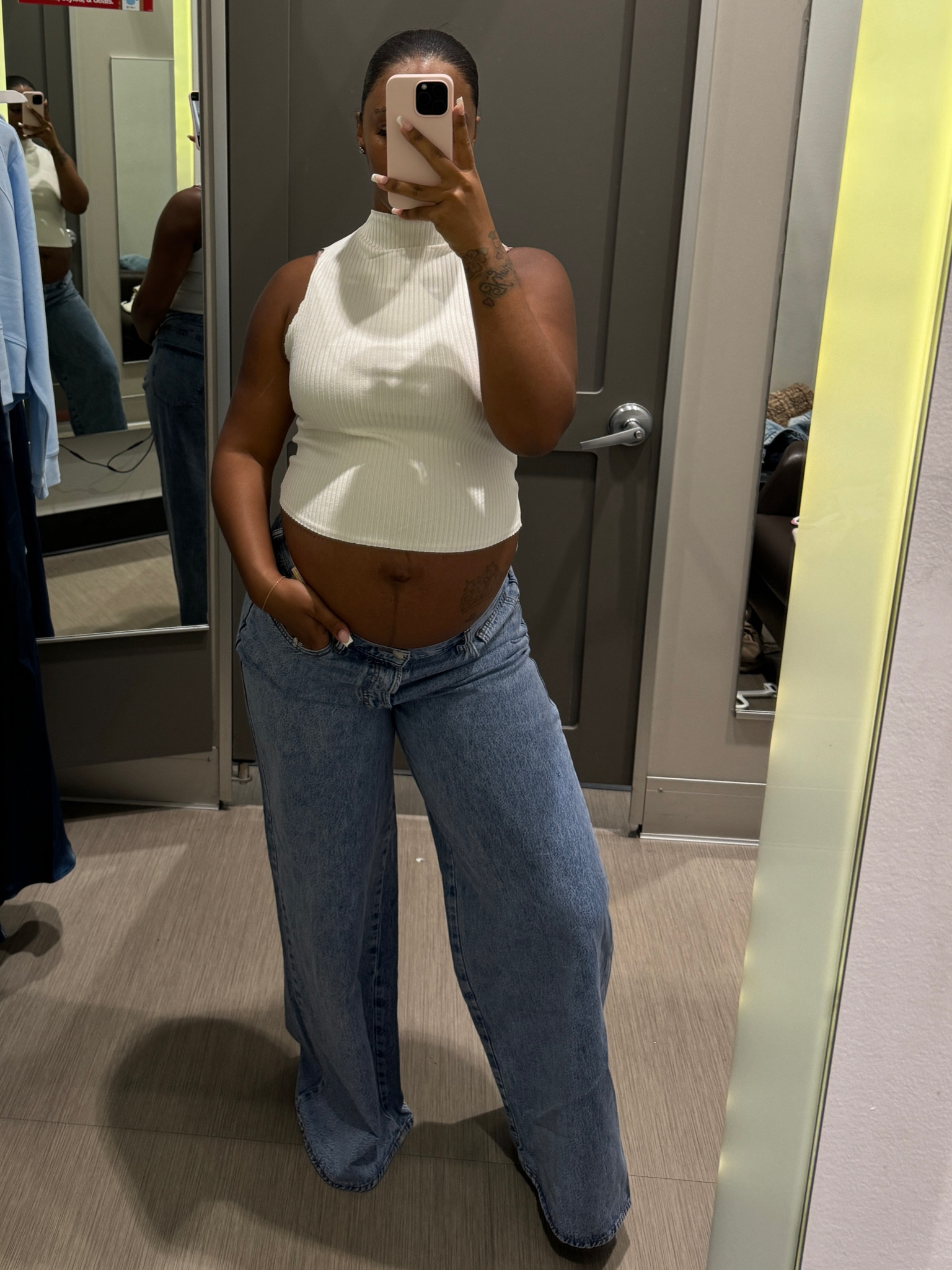 For some reason I am allergic to maternity clothes lol but these over sized jeans were perfect for me and my belly. And I loved this basic ribbed white tank. For reference I am wearing a large in the shirt and size 14 in the jeans 

#LTKBump #LTKStyleTip #LTKFindsUnder50