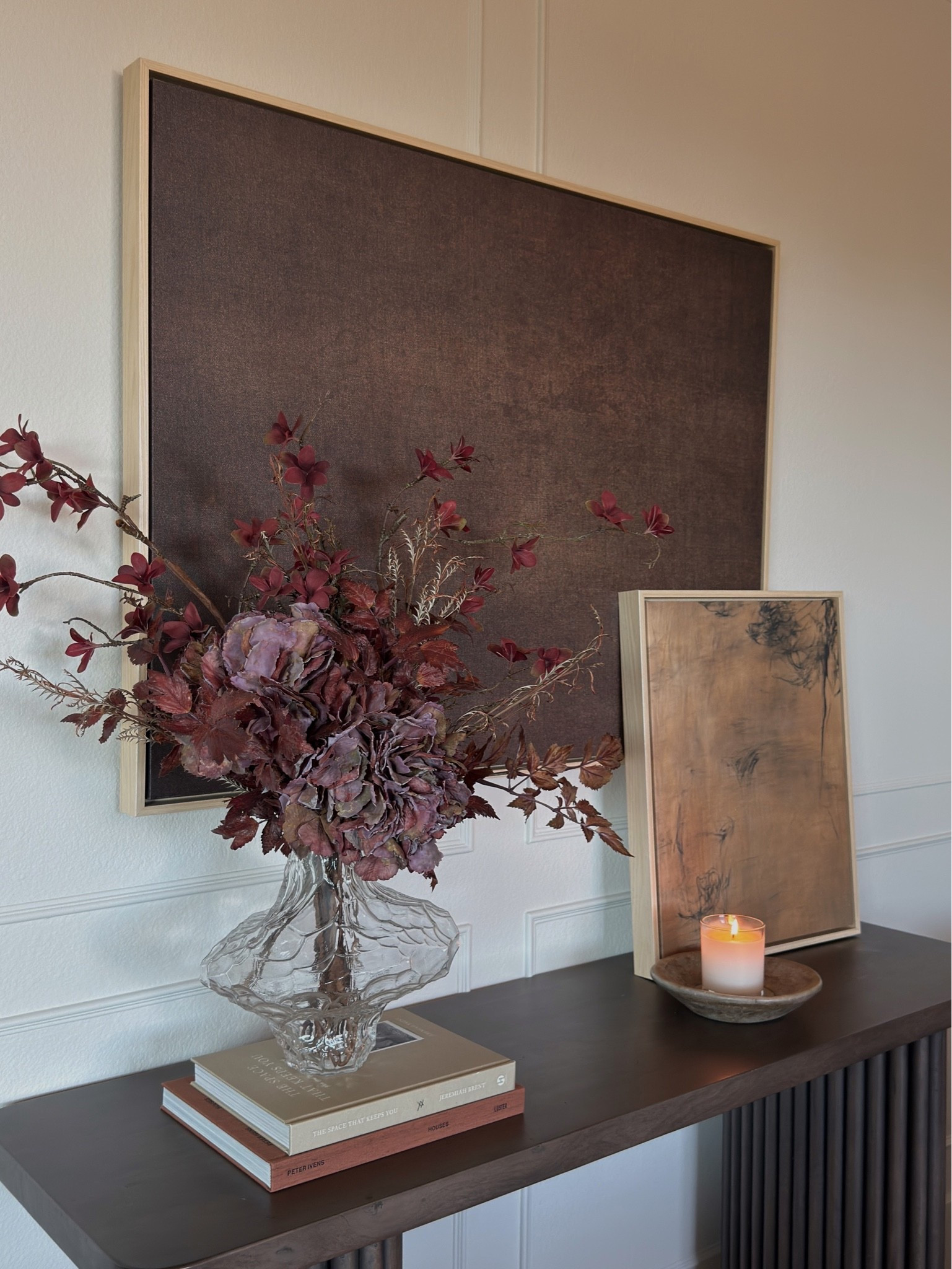 Fall is making its way into the house 🤎

I styled our console with warm brown artwork, layered textures, and a few collected pieces for that cozy, earthy feeling I love this time of year. Nothing too themed—just a warm, lived-in fall mood 🤎

#falldecor #fallhomedecor #organicmodernhome #neutralhomedecor #wabisabihome