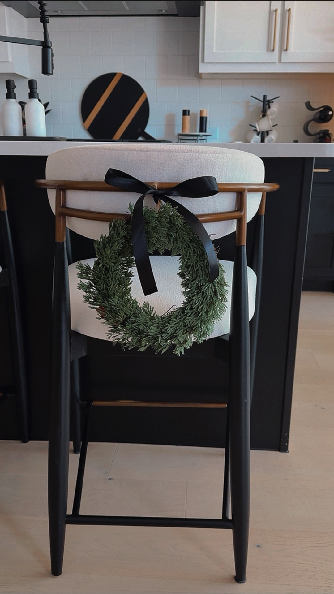 These mini wreaths on my viral Jagger stools add the perfect modern, minimalist Christmas touch. Linking the stools + wreaths for you!

I bought the wreaths from Hobby lobby for only $4 ea But I am also linking similar wreaths. 

The dimensions of my wreath are 5 1/2 inches for the inside diameter and 10 1/2 inches for the outside diameter.

#modernchristmasdecor
#holidaykitchen
#cozychristmasvibes #kitchenddecor #arhausjagger #arhaus #jaggerstool